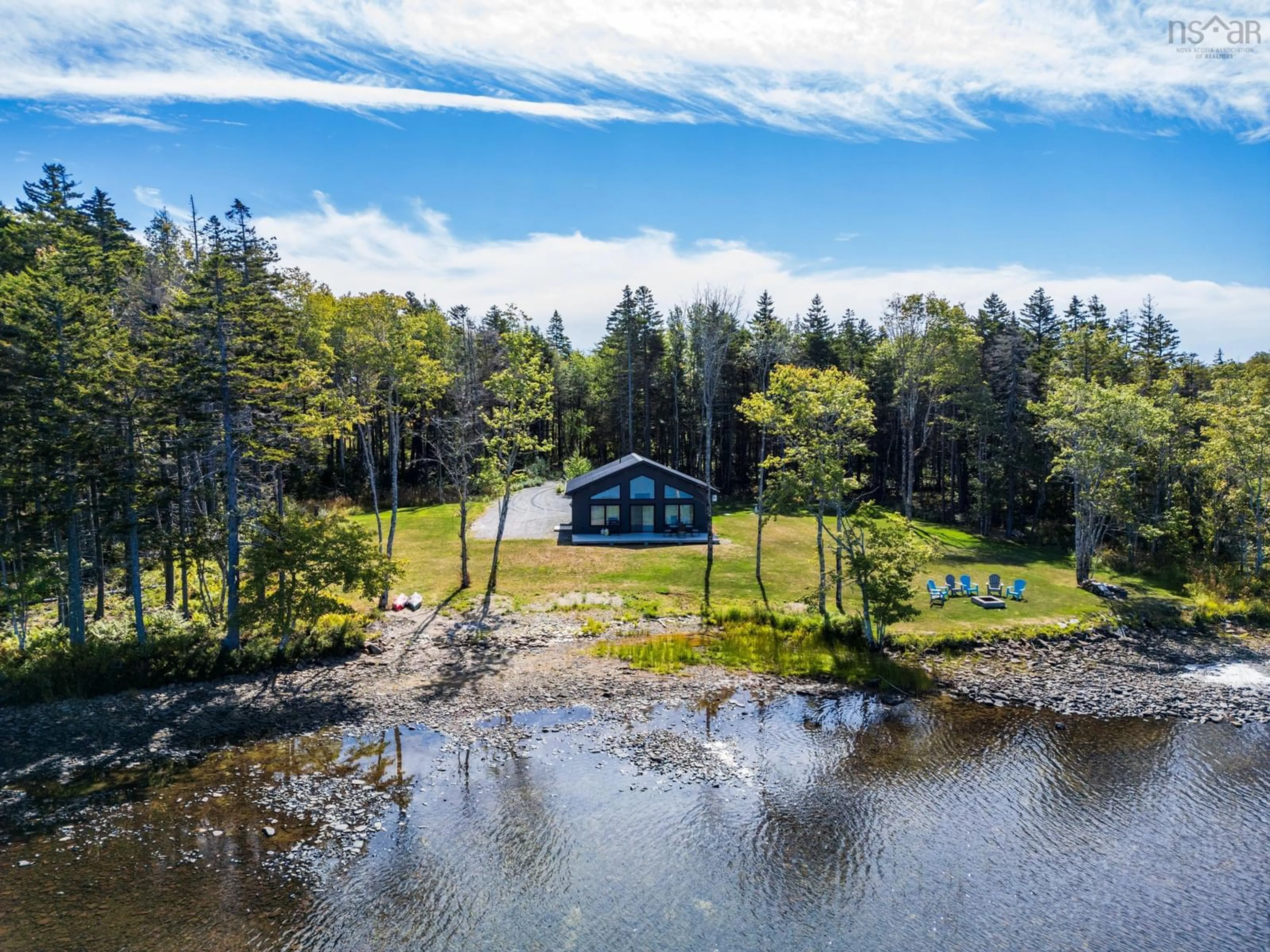 A pic from outside/outdoor area/front of a property/back of a property/a pic from drone, water/lake/river/ocean view for 43 Belliveau Lake Estates Road, Belliveaus Cove Nova Scotia B0W 1J0