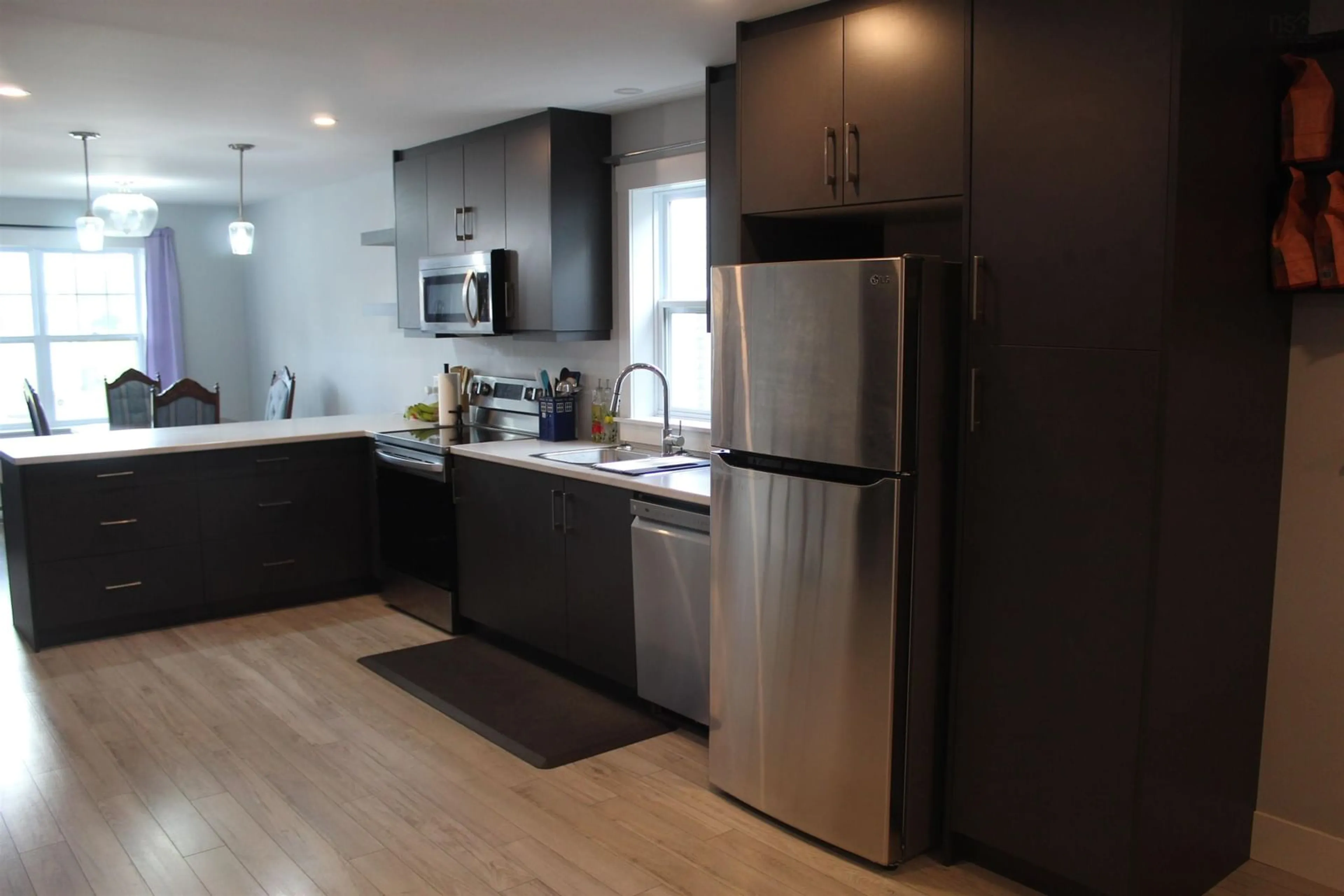 Open concept kitchen, wood/laminate floor for 20 Trout Run, Halifax Nova Scotia B3R 0C4