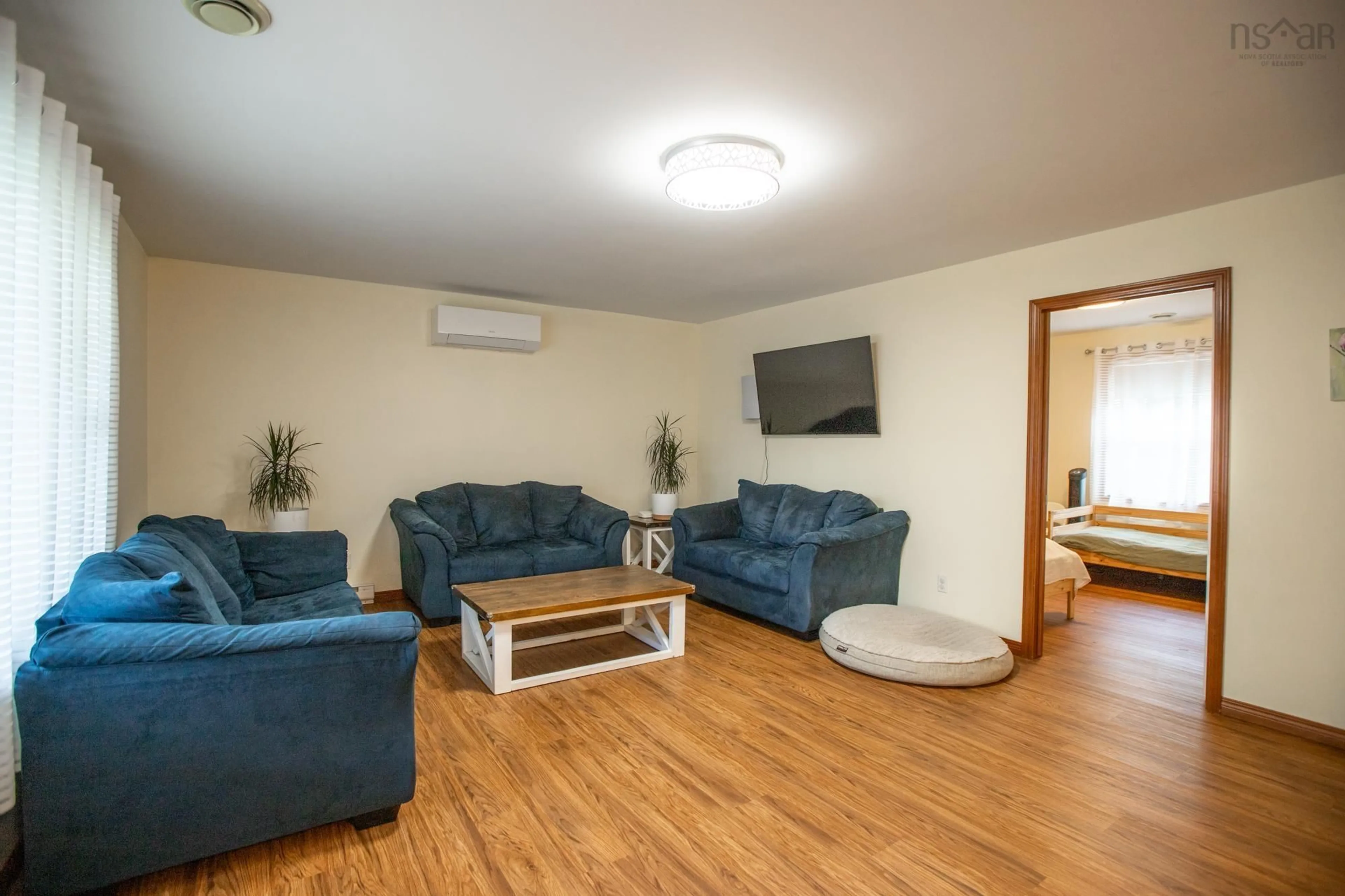 Living room with furniture, wood/laminate floor for 160 Silver Leaf Drive, Kinsac, Ns Dr, Kinsac Nova Scotia B4G 1G5