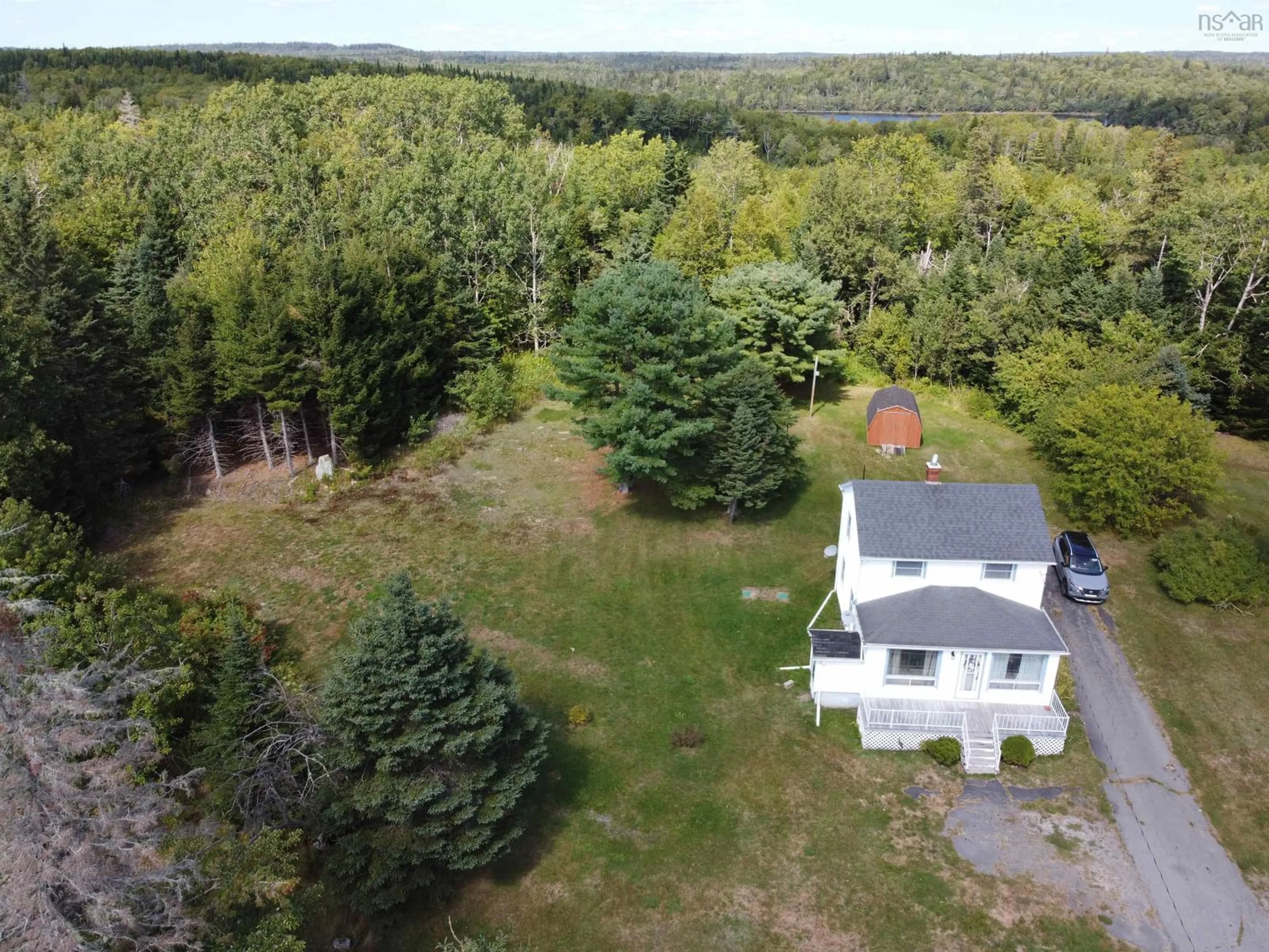A pic from outside/outdoor area/front of a property/back of a property/a pic from drone, forest/trees view for 344 Highway 224, Sheet Harbour Nova Scotia B0J 3B0