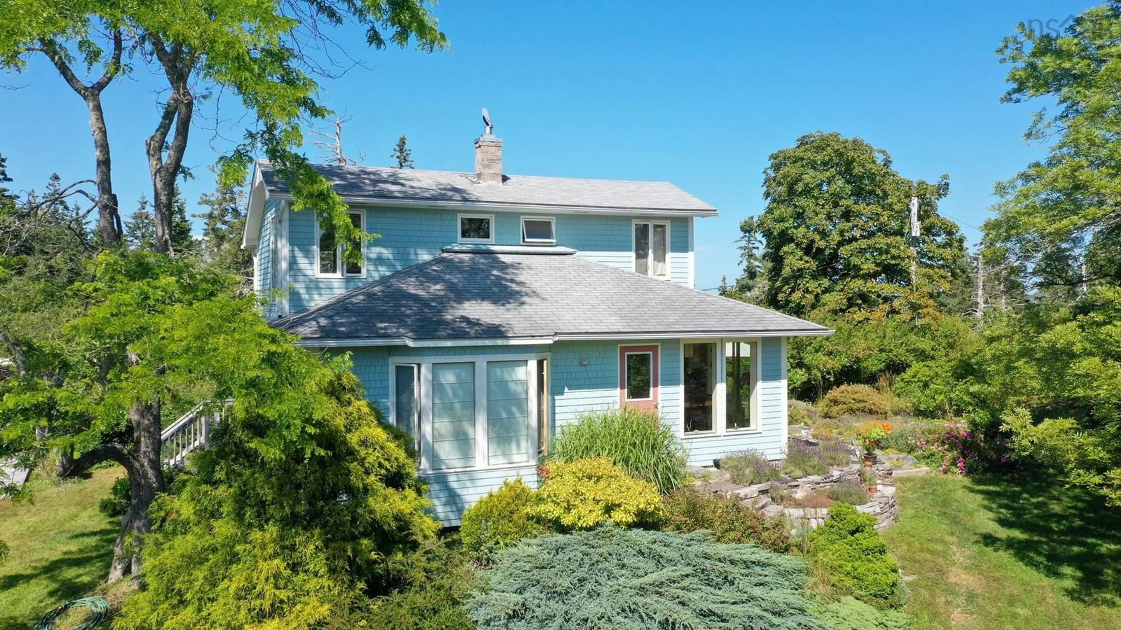 A pic from outside/outdoor area/front of a property/back of a property/a pic from drone, water/lake/river/ocean view for 1840 West Sable Rd, Little Harbour Nova Scotia B0T 1V0