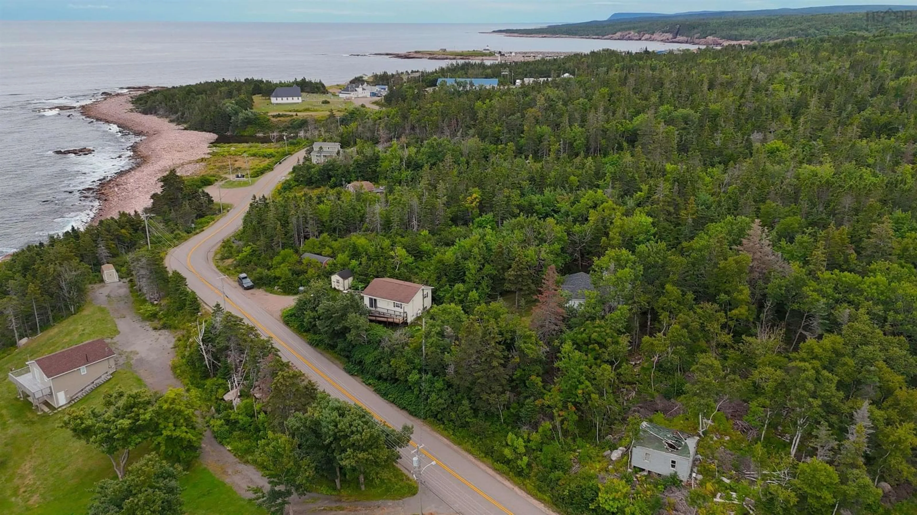 A pic from outside/outdoor area/front of a property/back of a property/a pic from drone, water/lake/river/ocean view for 339 New Haven Rd, New Haven Nova Scotia B0C 1N0