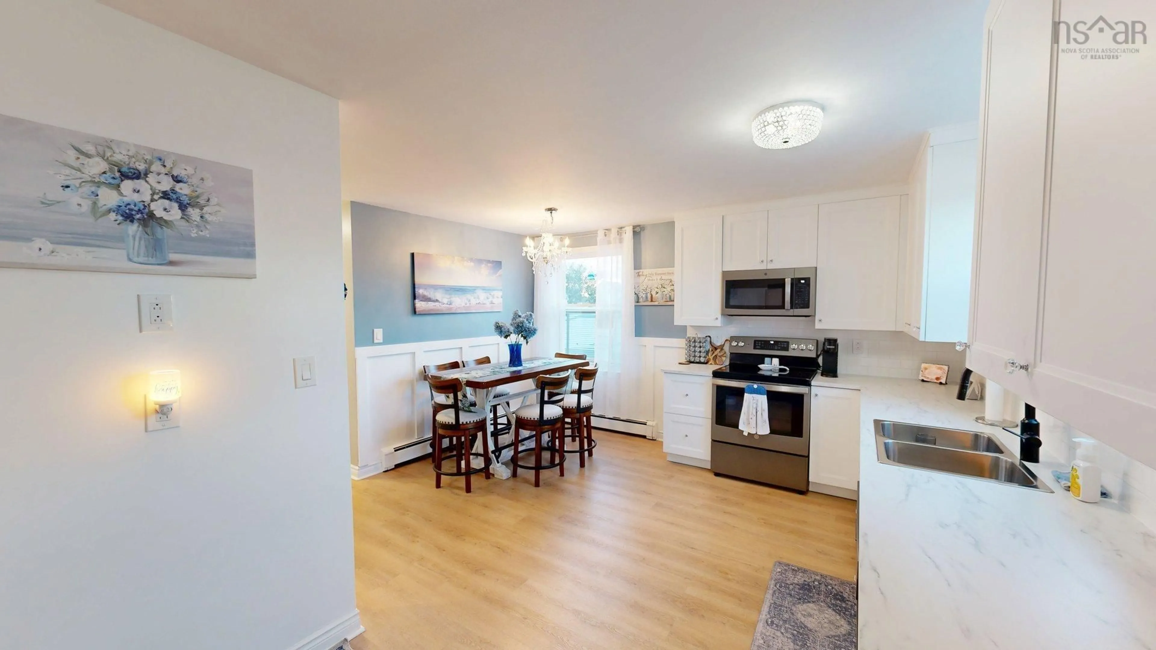 Open concept kitchen, wood/laminate floor for 4 Cooling Street, Glace Bay Nova Scotia B1A 5R7