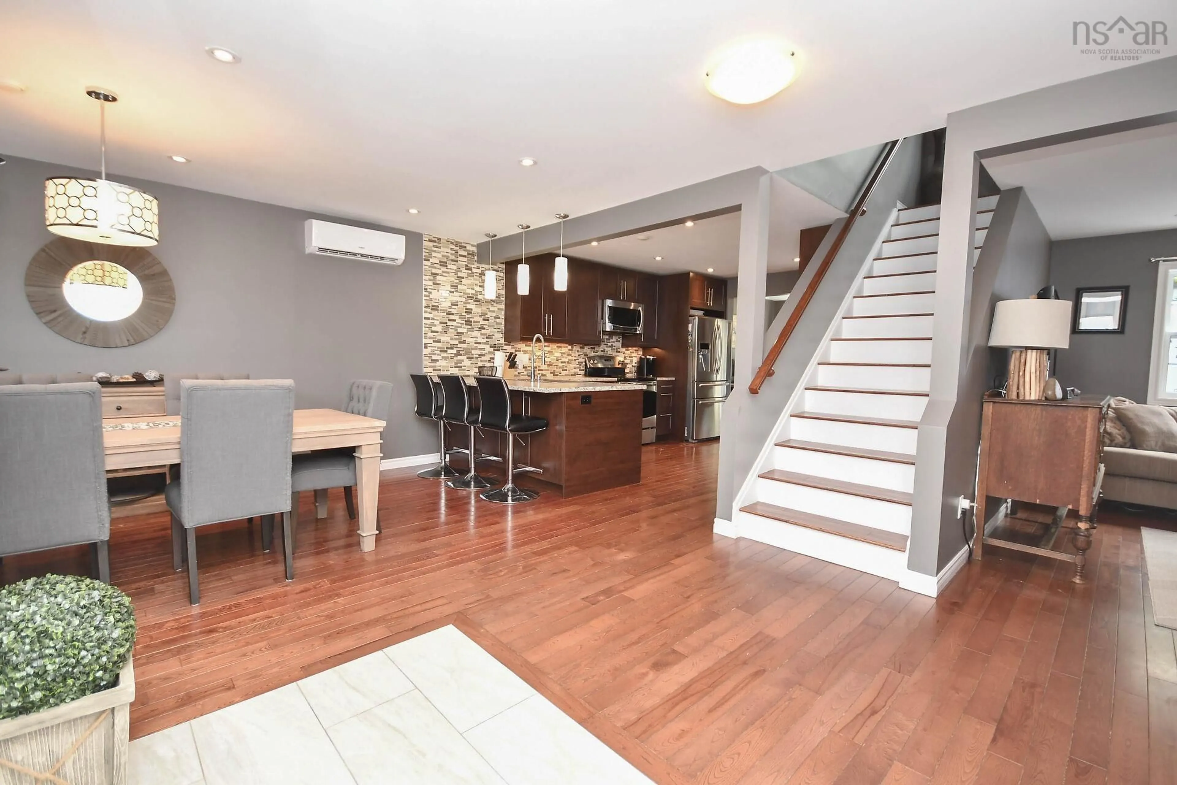 Open concept kitchen, wood/laminate floor for 31 St. Michaels Ave, Spryfield Nova Scotia B3P 1M6