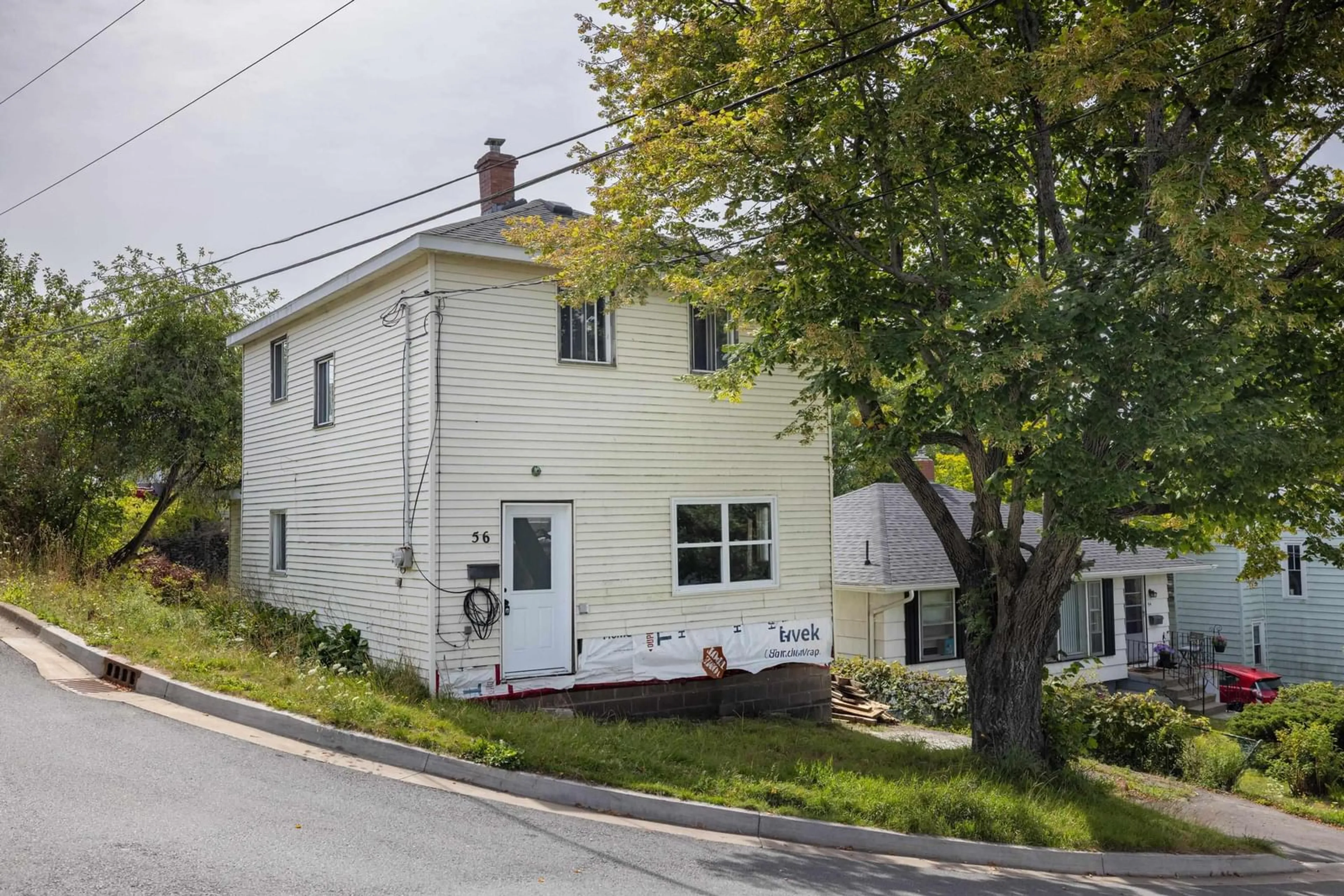 A pic from outside/outdoor area/front of a property/back of a property/a pic from drone, street for 56 Irving St, Dartmouth Nova Scotia B2W 1K2