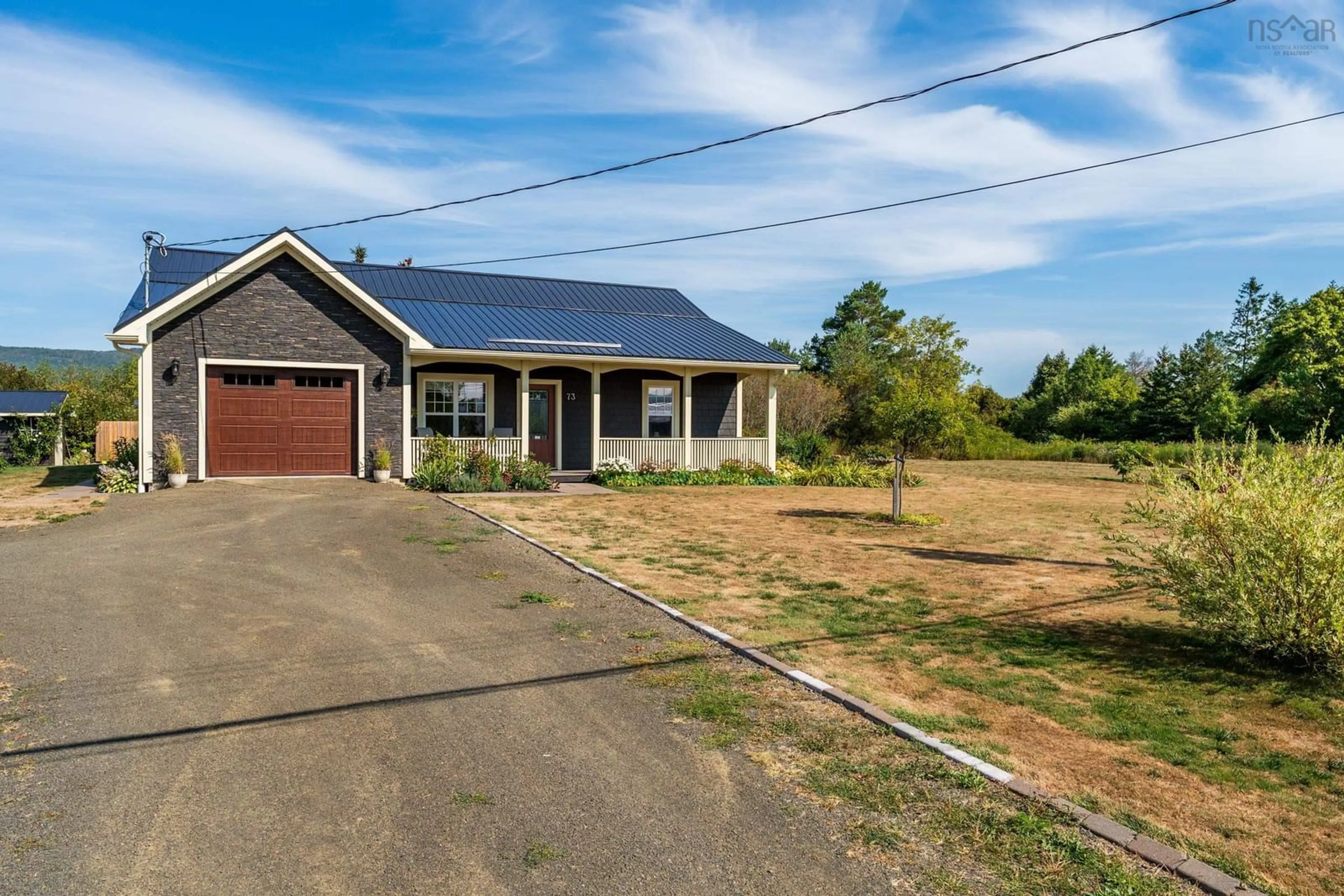 A pic from outside/outdoor area/front of a property/back of a property/a pic from drone, street for 73 Granville St, Bridgetown Nova Scotia B0S 1C0