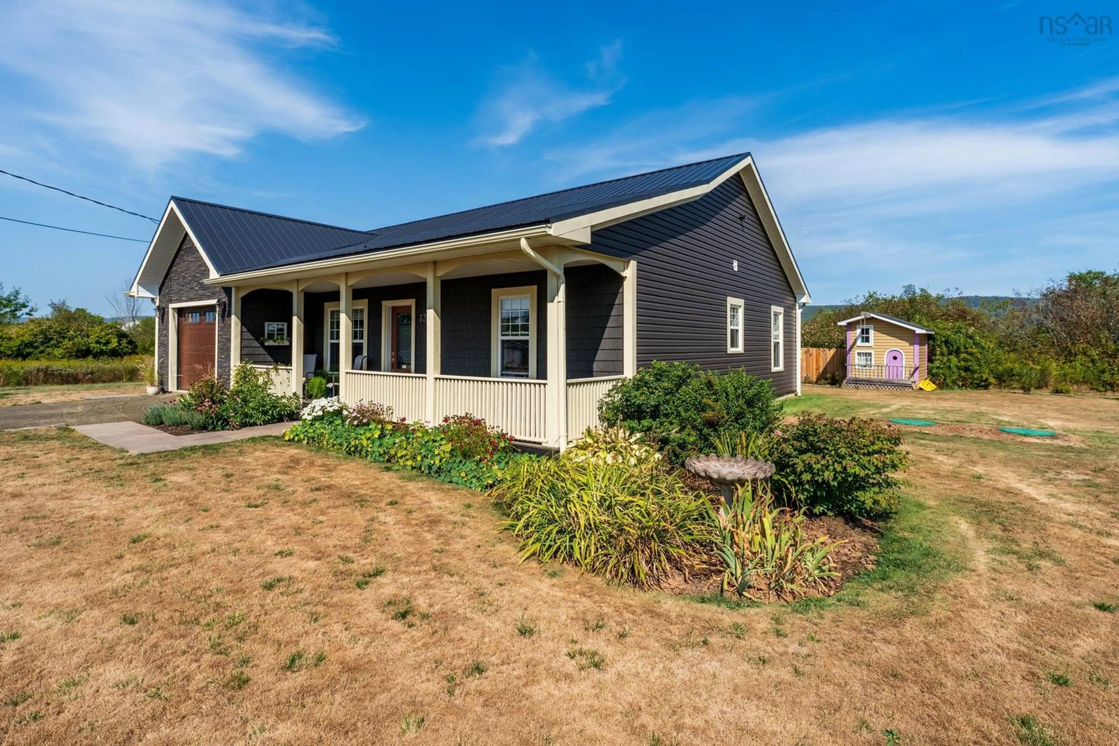 Home with vinyl exterior material, street for 73 Granville St, Bridgetown Nova Scotia B0S 1C0