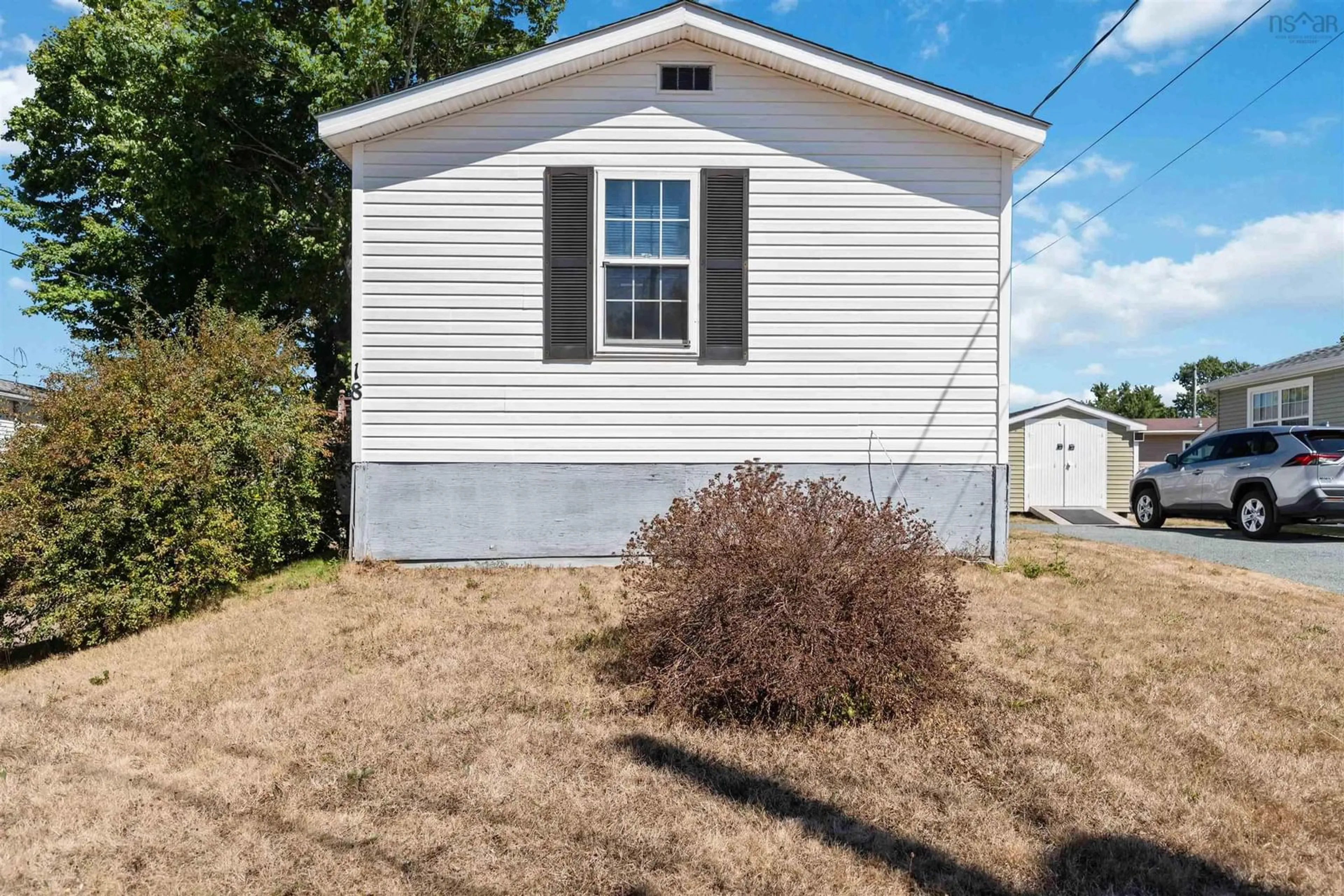 Home with vinyl exterior material, street for 18 Shamrock Dr, New Minas Nova Scotia B4N 3T9