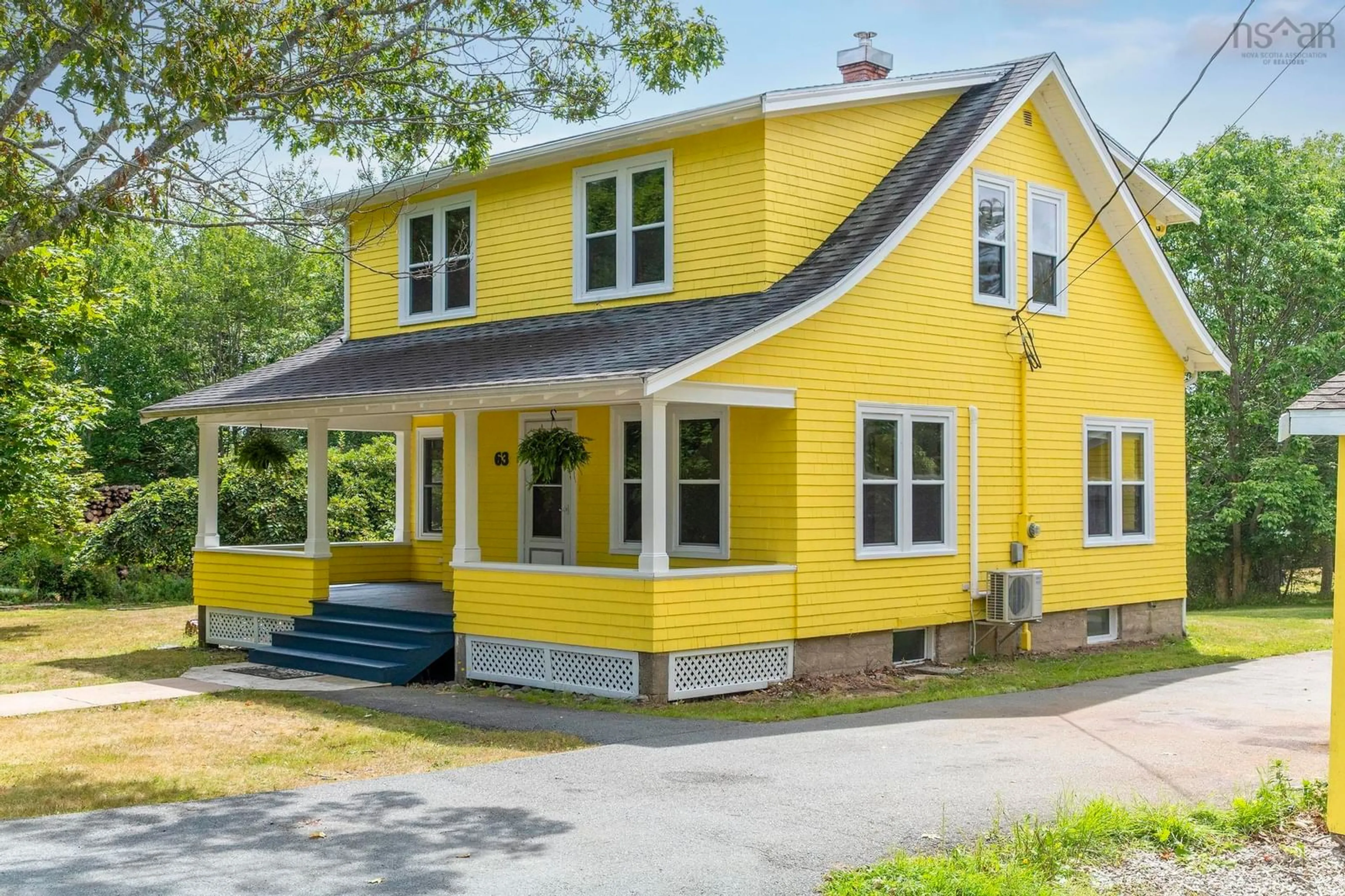 Home with vinyl exterior material, street for 63 Croft Rd, Chester Basin Nova Scotia B0J 1K0