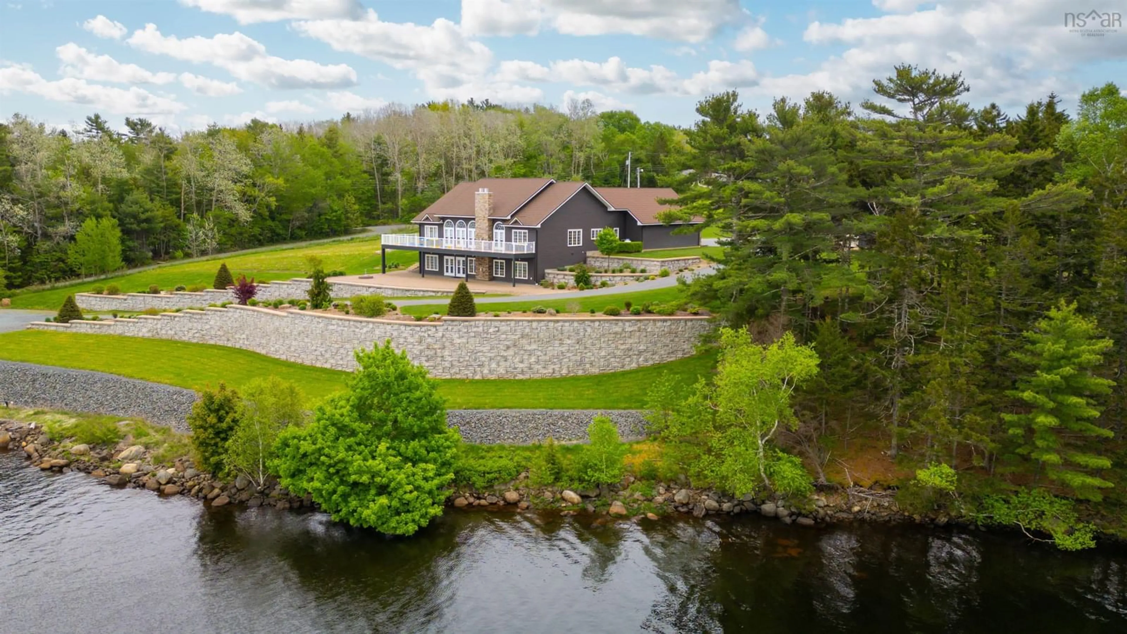 A pic from outside/outdoor area/front of a property/back of a property/a pic from drone, water/lake/river/ocean view for 2539 Highway 331, West Lahave Nova Scotia B0R 1G0