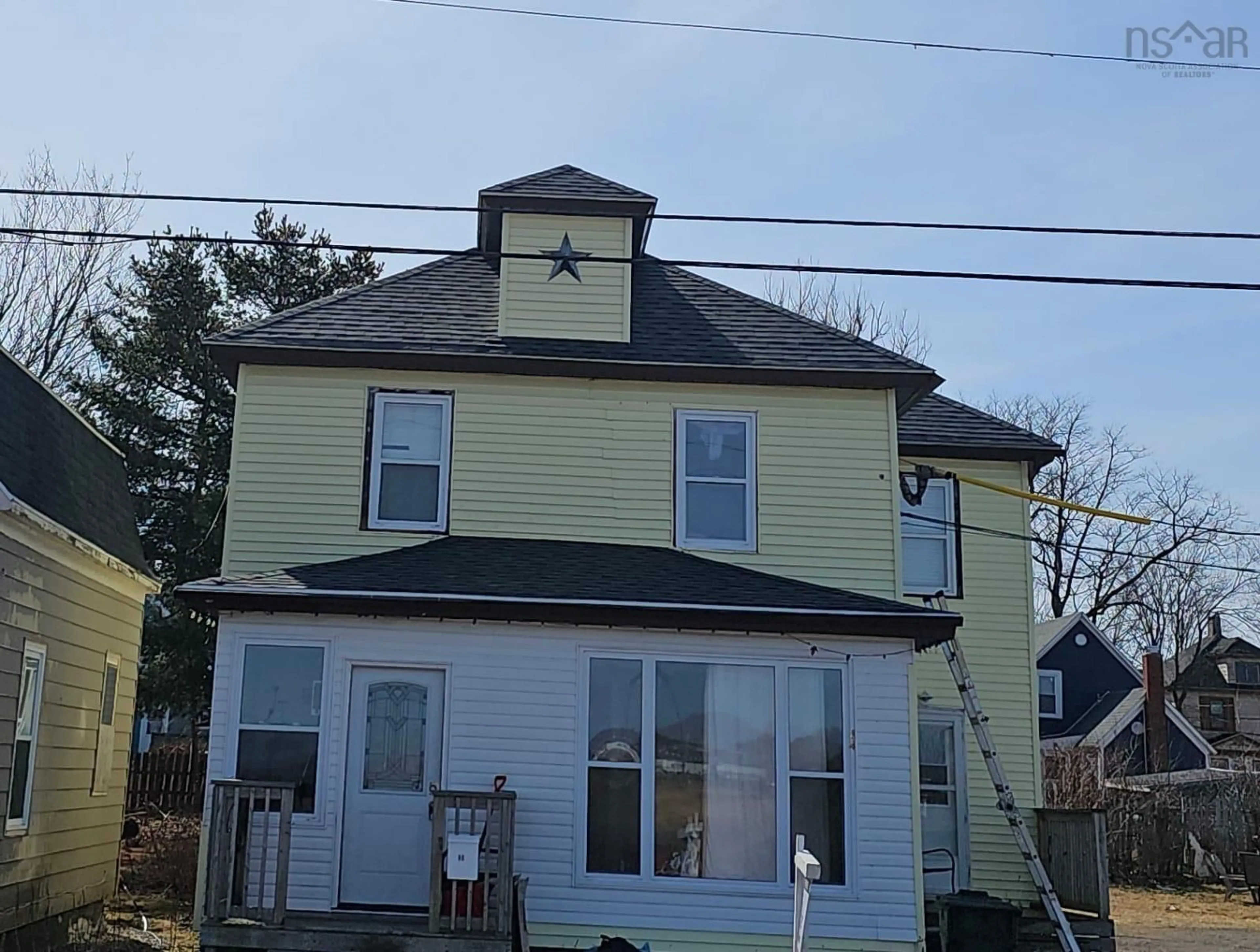 Home with vinyl exterior material, street for 84 Intercolonial St, Sydney Nova Scotia B1P 1S6