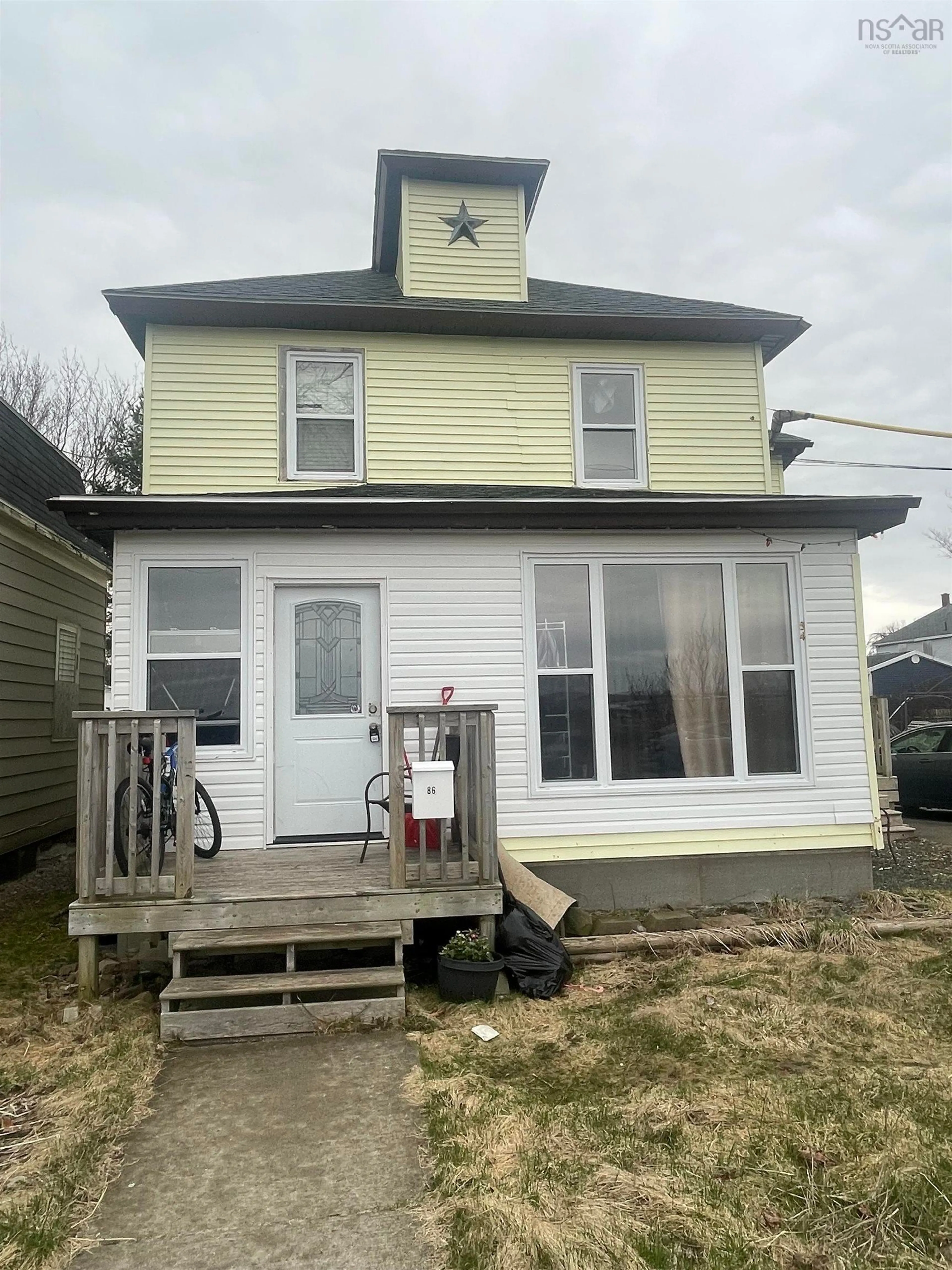 Home with vinyl exterior material, building for 84 Intercolonial St, Sydney Nova Scotia B1P 1S6