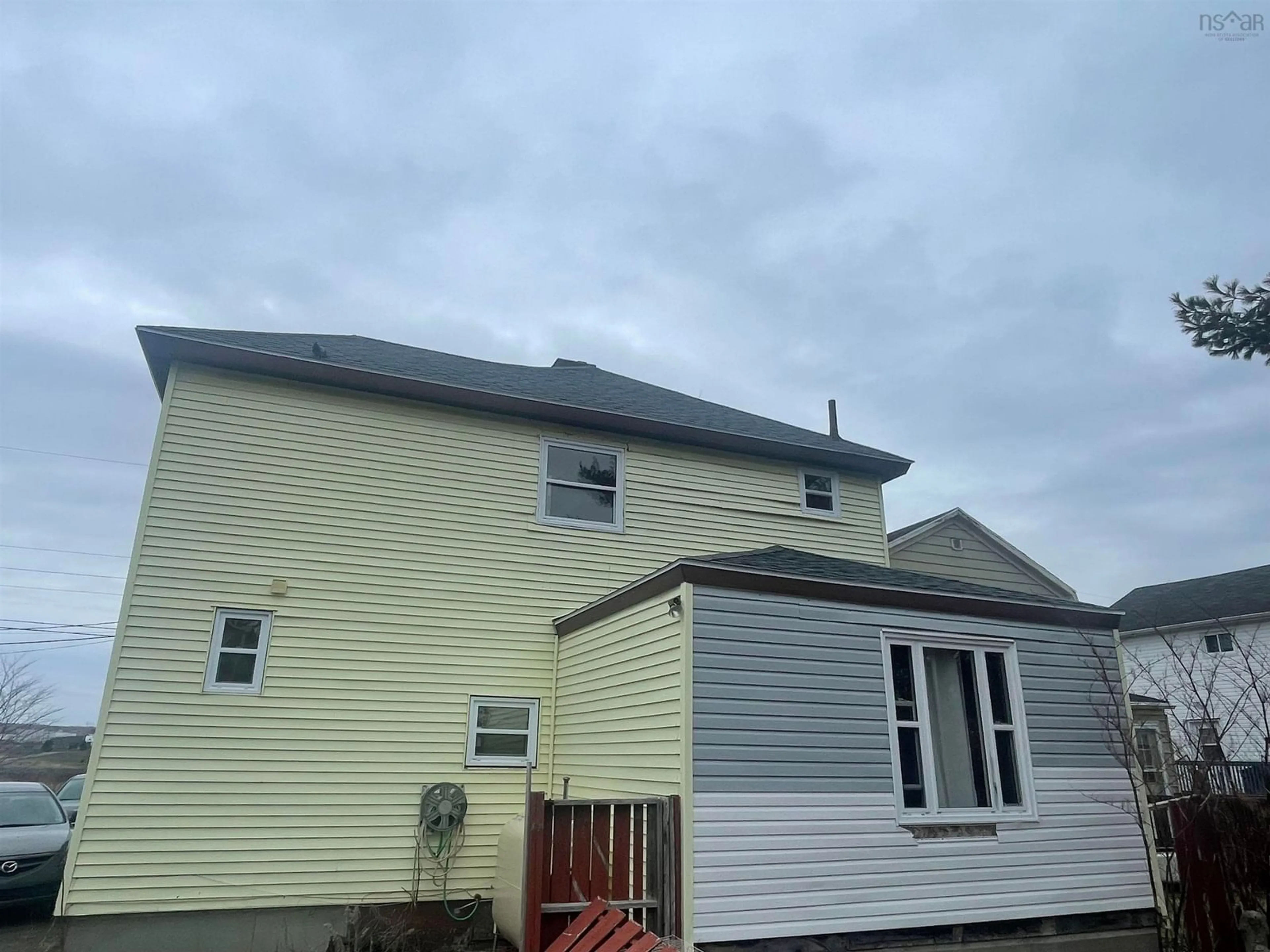 Home with vinyl exterior material, building for 84 Intercolonial St, Sydney Nova Scotia B1P 1S6