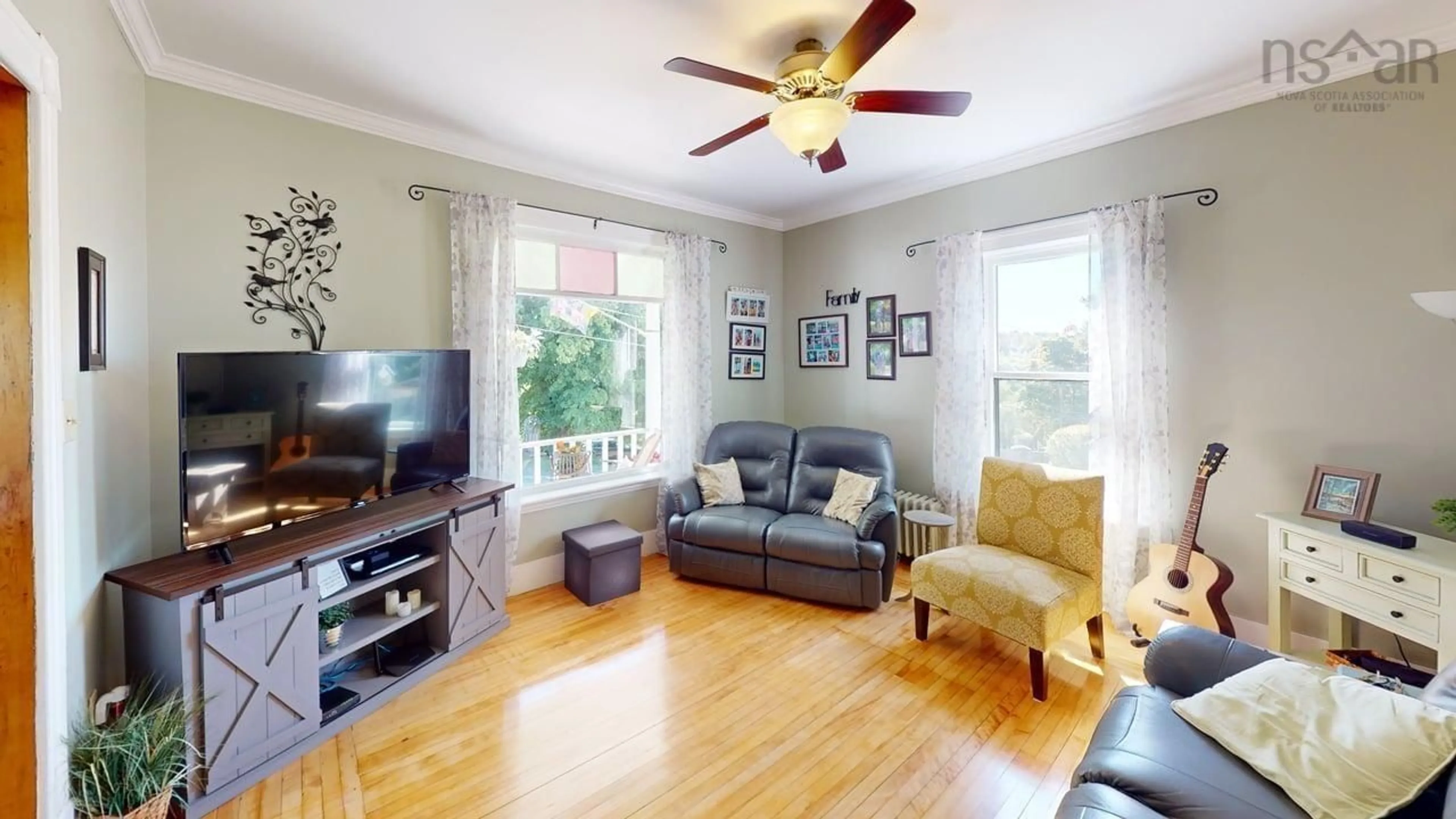 Living room with furniture, wood/laminate floor for 34 Duke St, New Glasgow Nova Scotia B2H 1R1