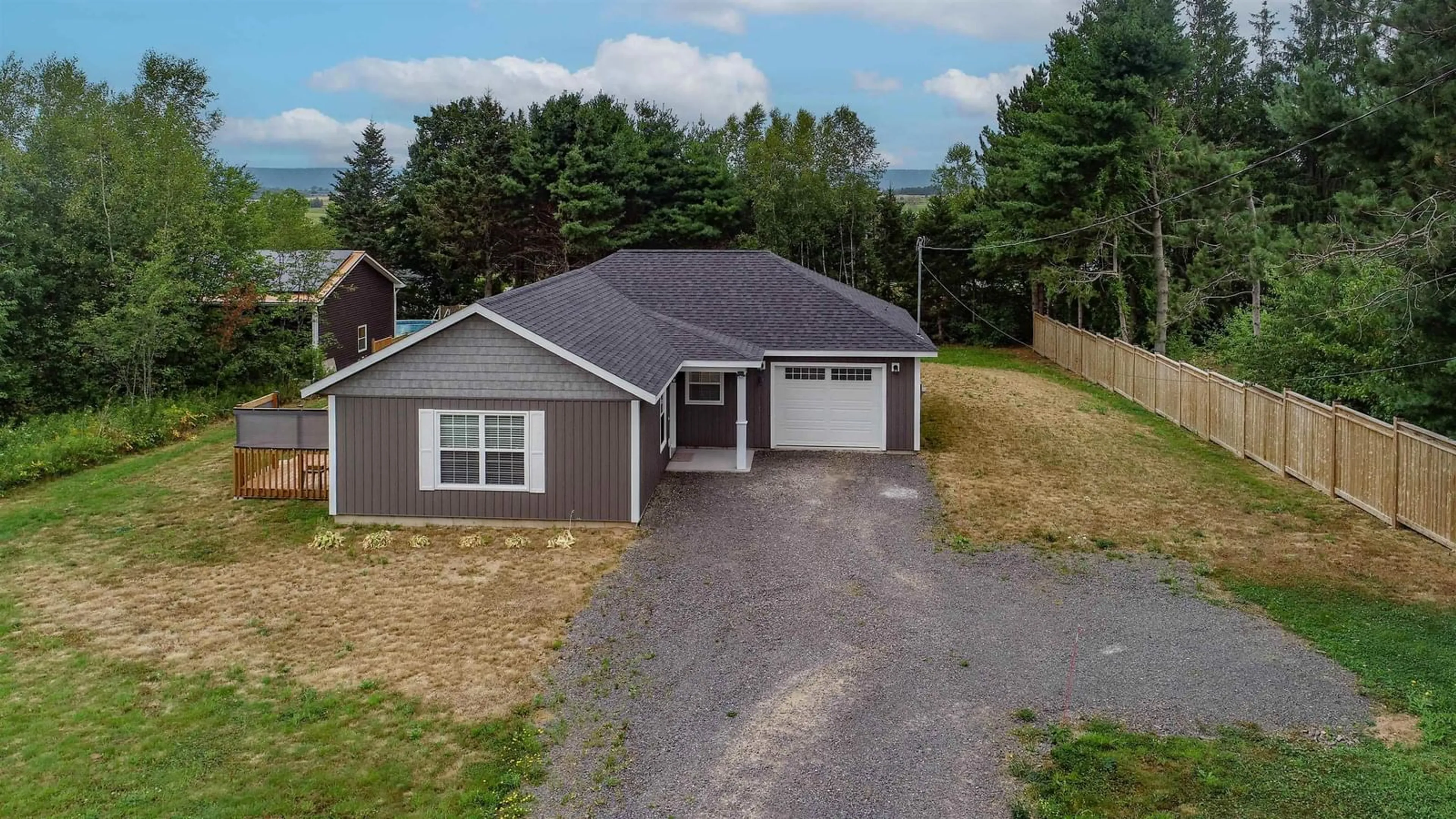 A pic from outside/outdoor area/front of a property/back of a property/a pic from drone, street for 35 Blomidon View Dr, Port Williams Nova Scotia B0P 1T0