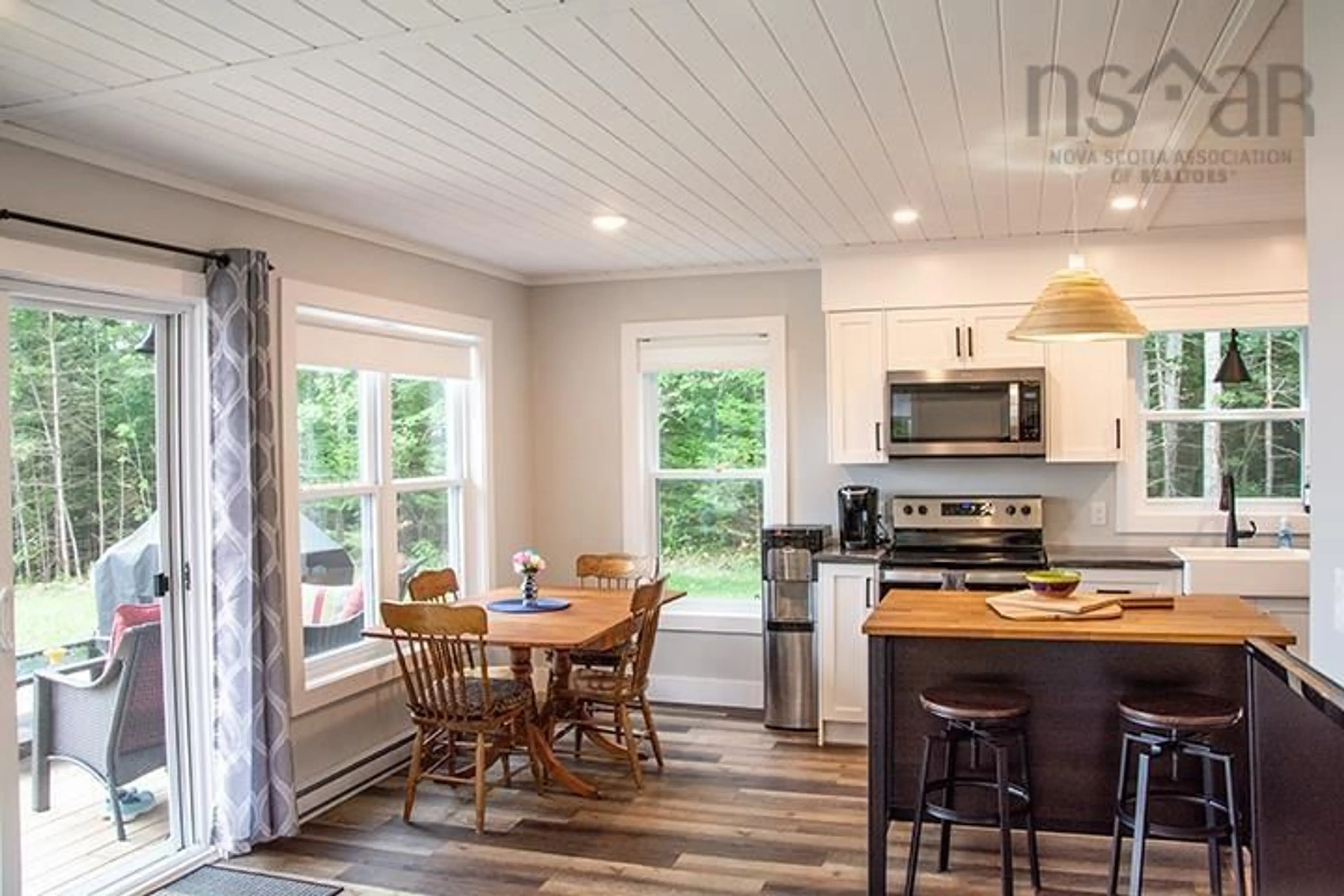 Open concept kitchen, wood/laminate floor for 74 Meek Arm Trail, East Uniacke Nova Scotia B0N 1Z0