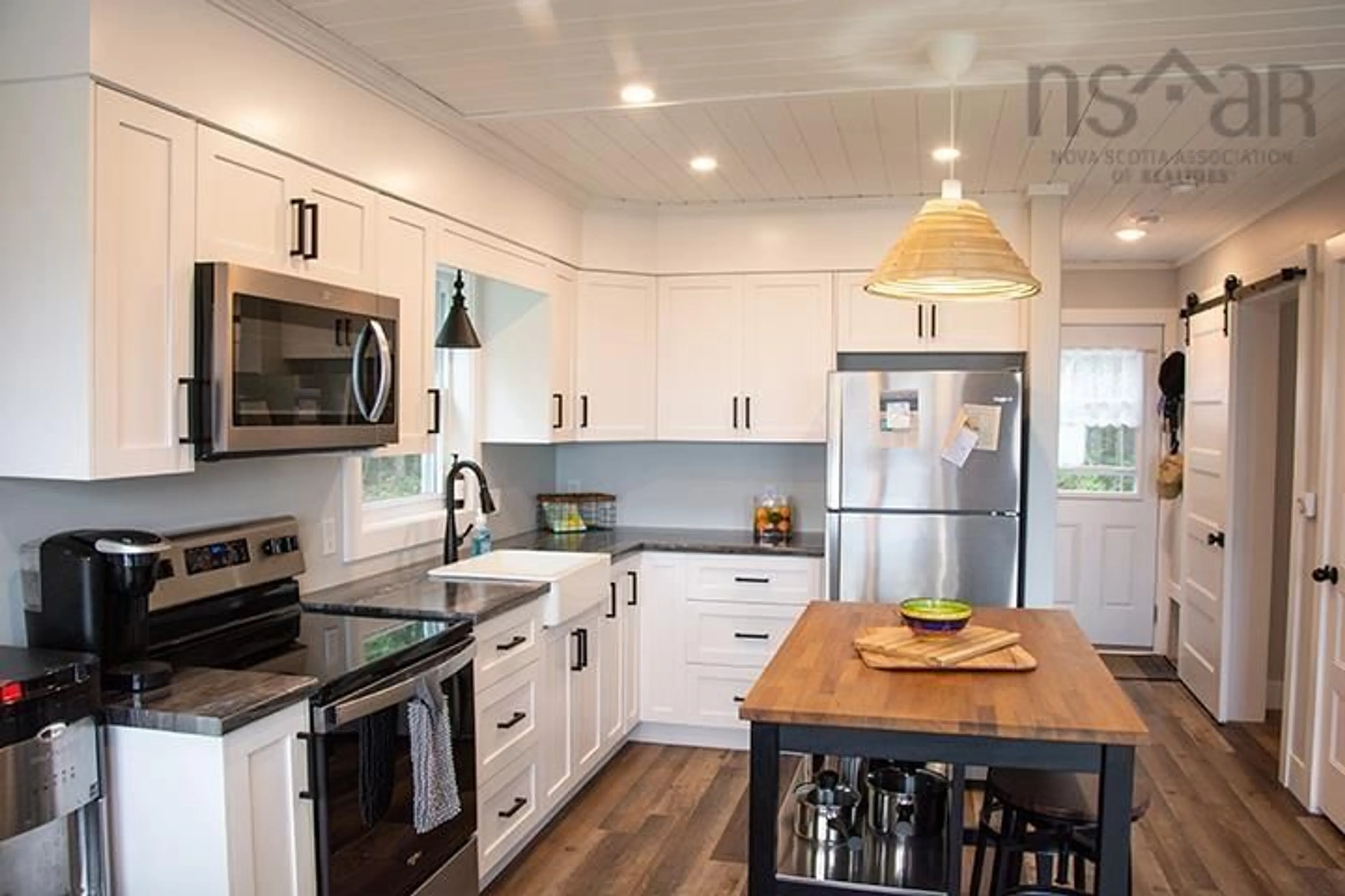Open concept kitchen, wood/laminate floor for 74 Meek Arm Trail, East Uniacke Nova Scotia B0N 1Z0