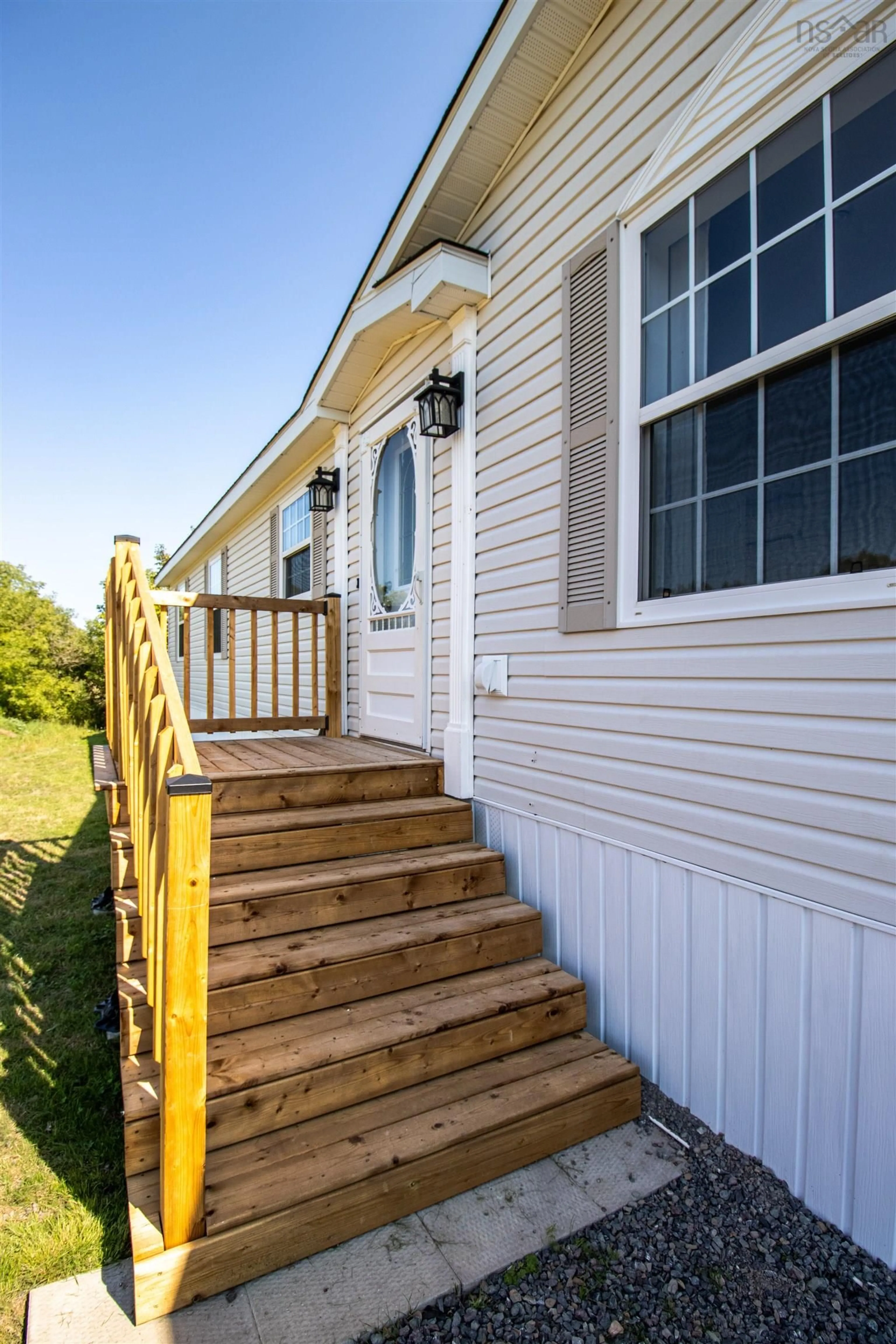 Home with vinyl exterior material, street for 24 Bridgeview Dr, Murray Siding Nova Scotia B6L 3B5
