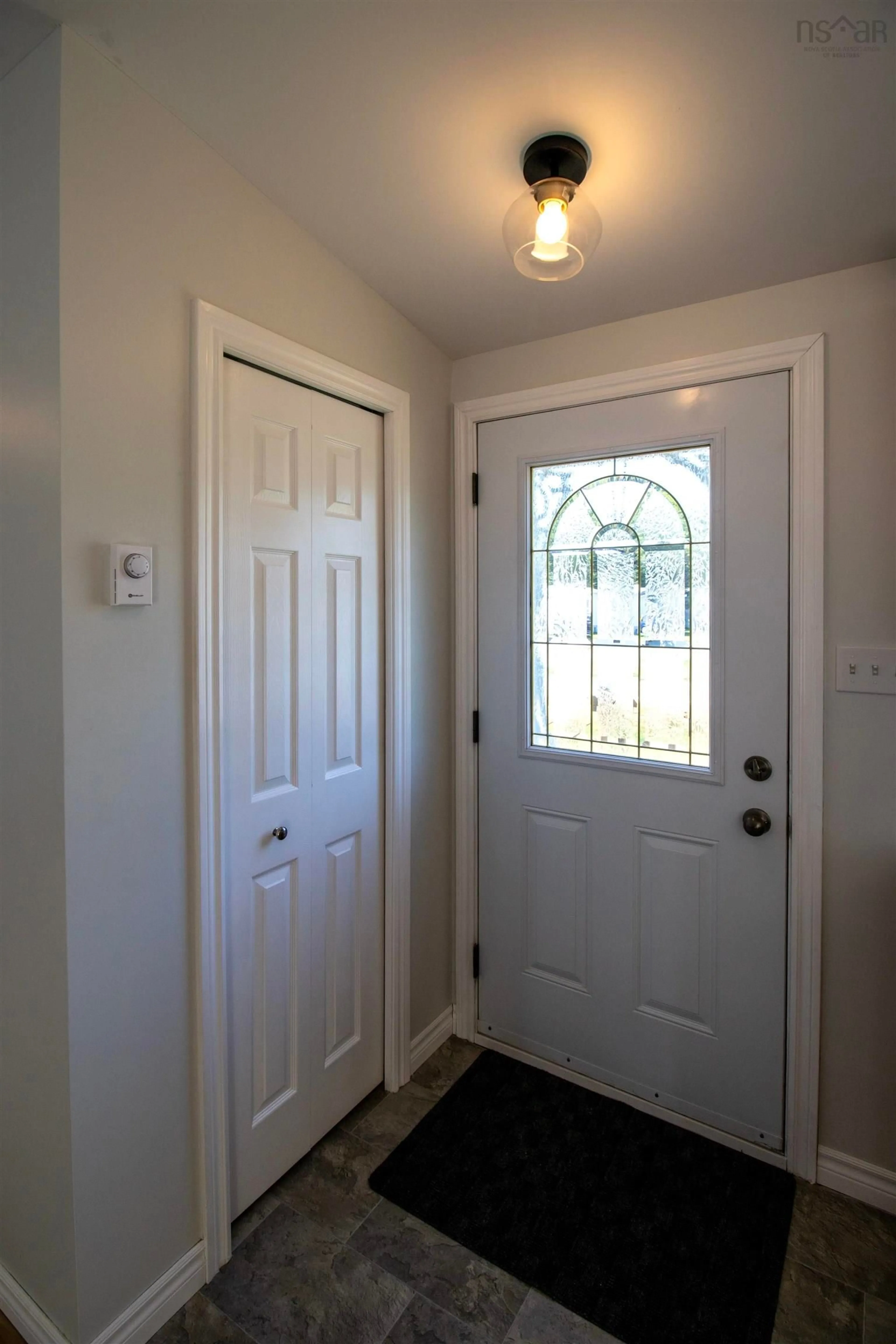 Indoor entryway for 24 Bridgeview Dr, Murray Siding Nova Scotia B6L 3B5