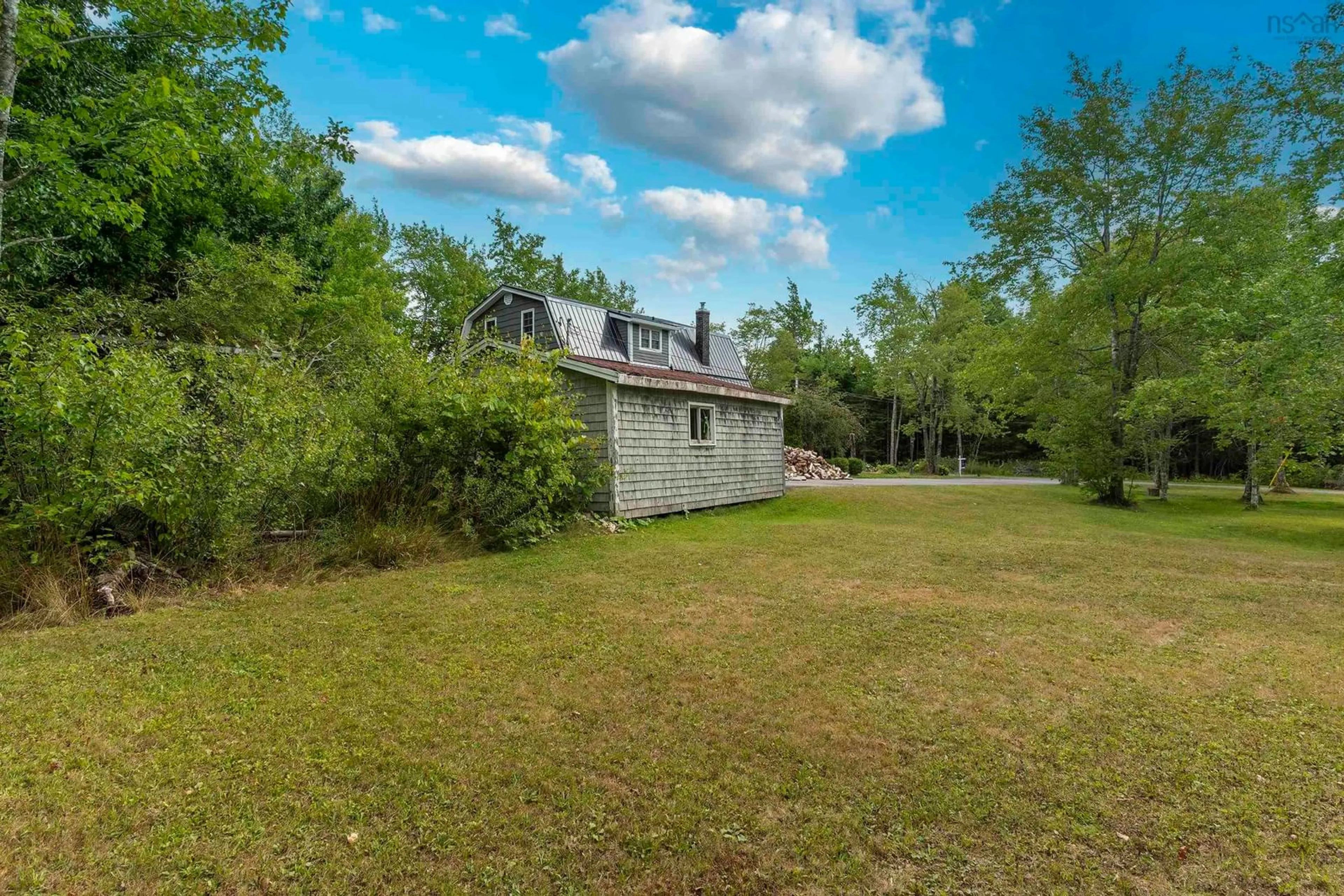 A pic from outside/outdoor area/front of a property/back of a property/a pic from drone, water/lake/river/ocean view for 1555 Highway 2, Milford Nova Scotia B0N 1Y0