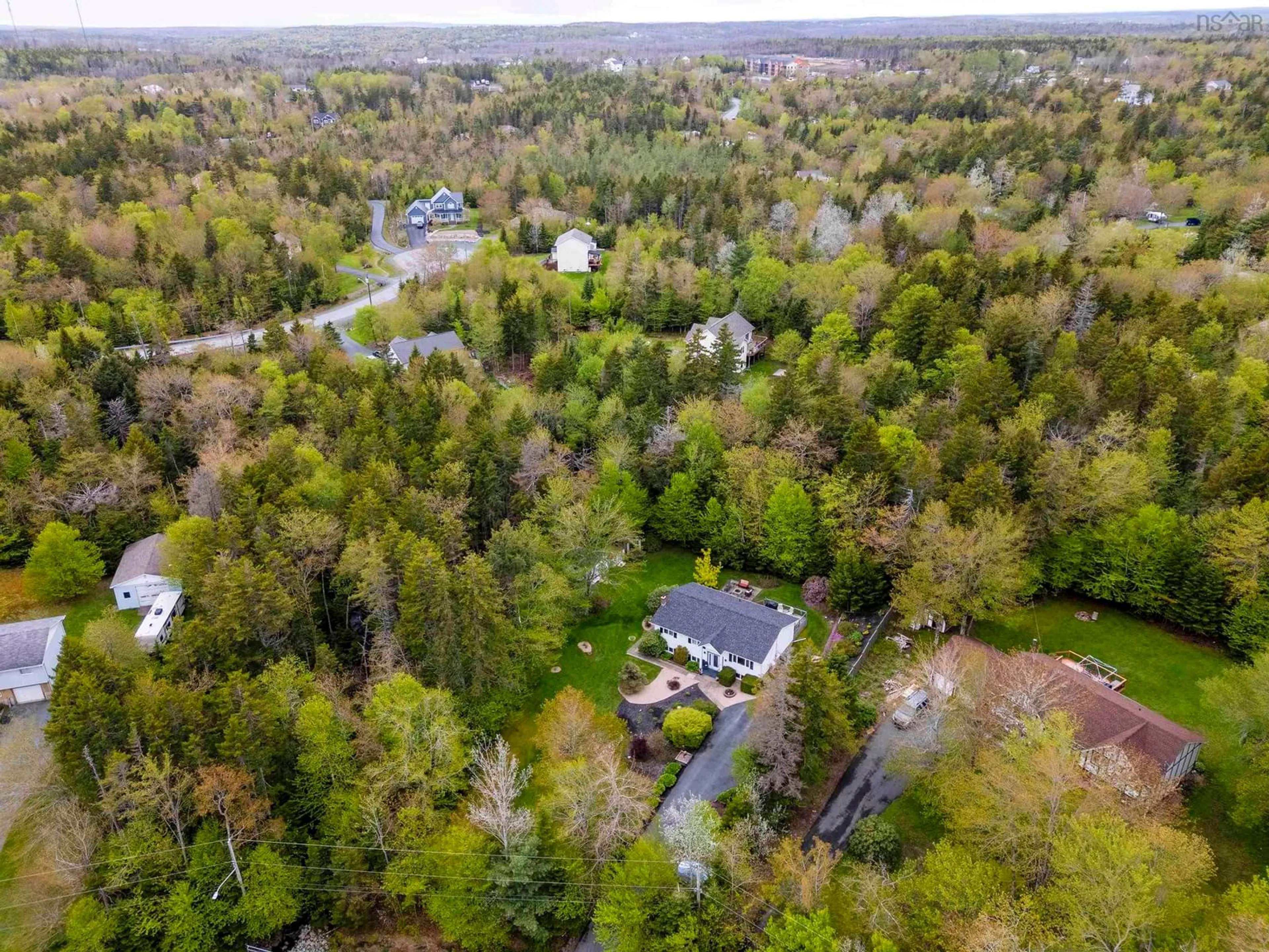 A pic from outside/outdoor area/front of a property/back of a property/a pic from drone, forest/trees view for 20 Kipawa Cres, Hammonds Plains Nova Scotia B4B 1N2