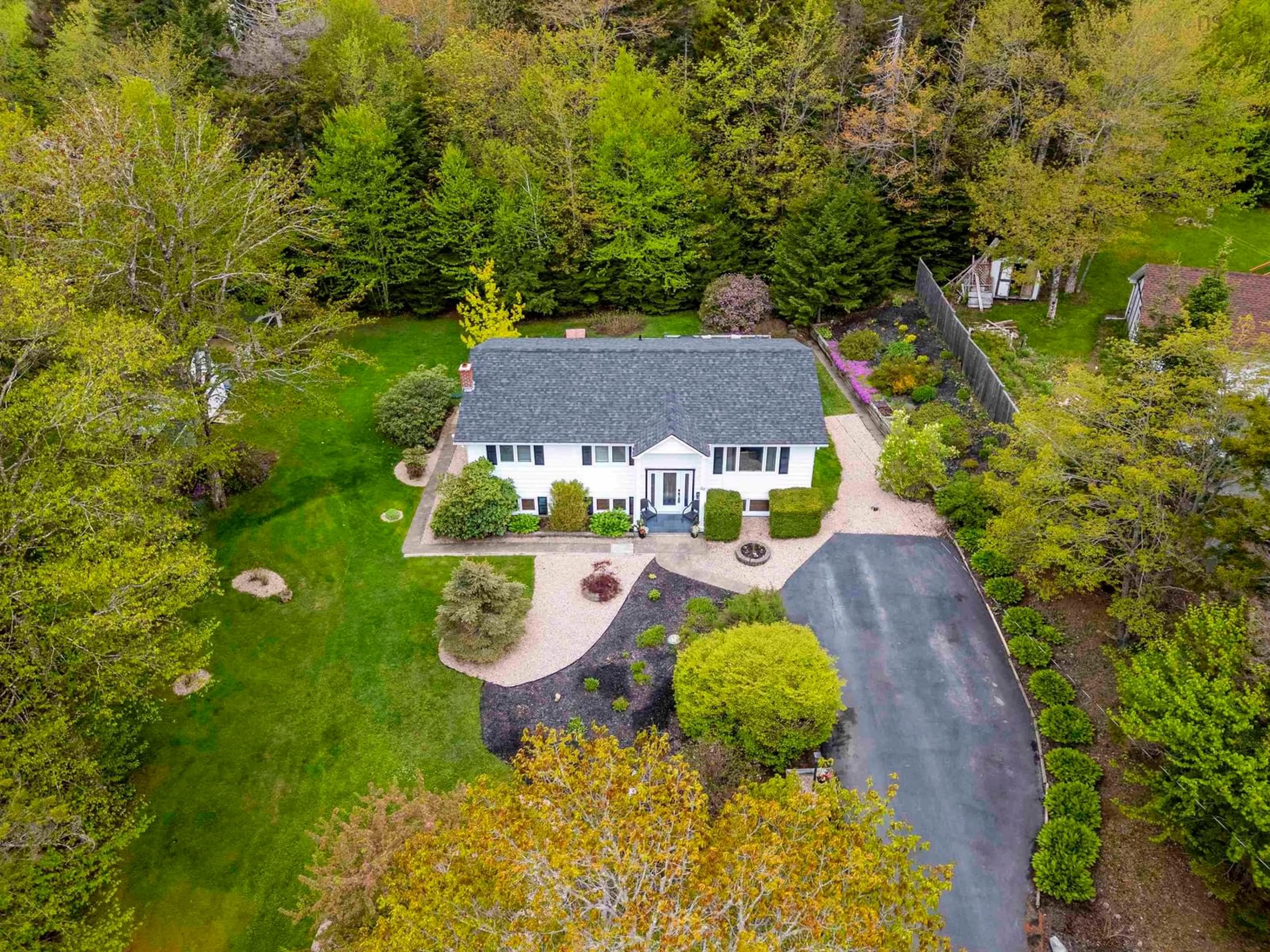A pic from outside/outdoor area/front of a property/back of a property/a pic from drone, street for 20 Kipawa Cres, Hammonds Plains Nova Scotia B4B 1N2