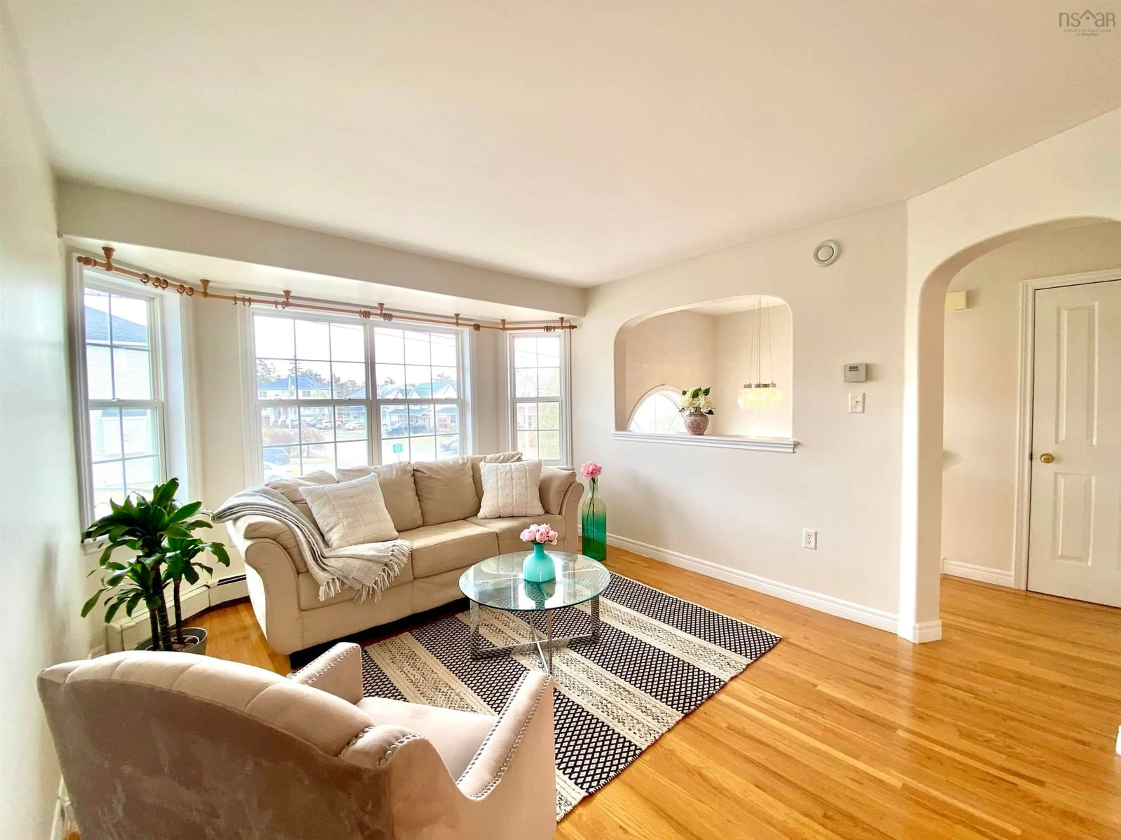 Living room with furniture, wood/laminate floor for 223 Oceanview Dr, Halifax Nova Scotia B4A 4G9