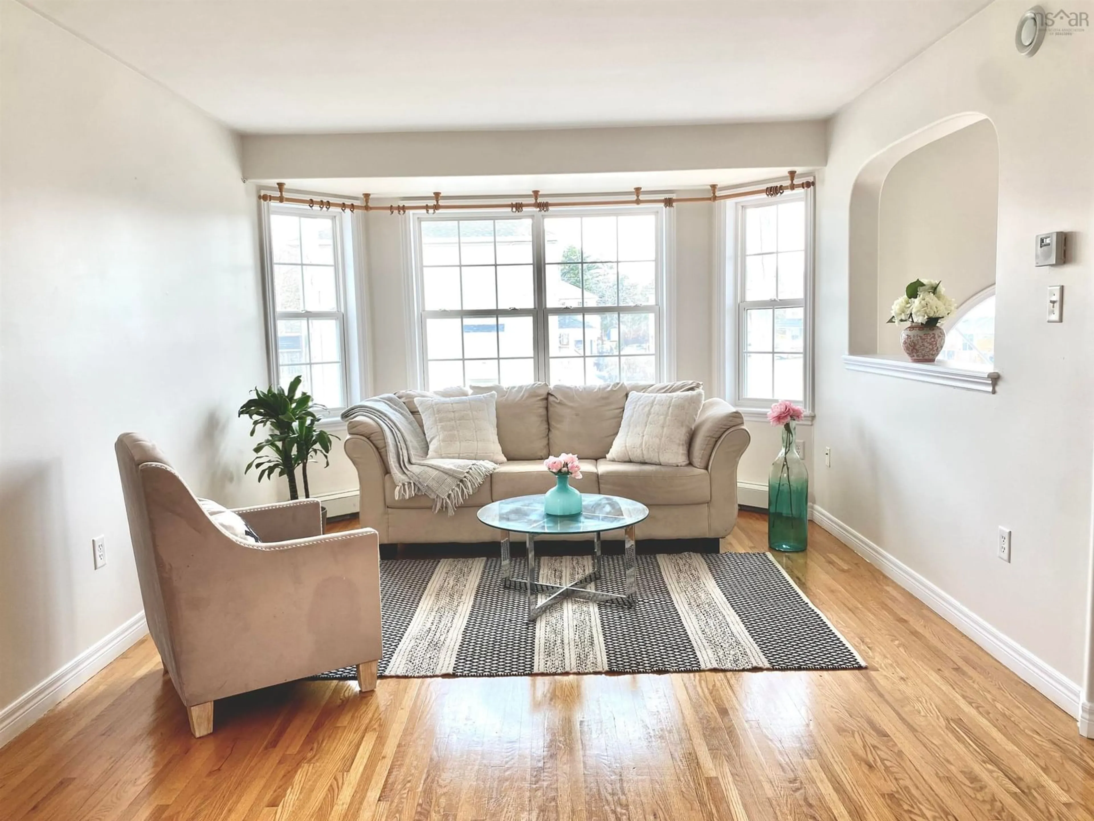 Living room with furniture, wood/laminate floor for 223 Oceanview Dr, Halifax Nova Scotia B4A 4G9