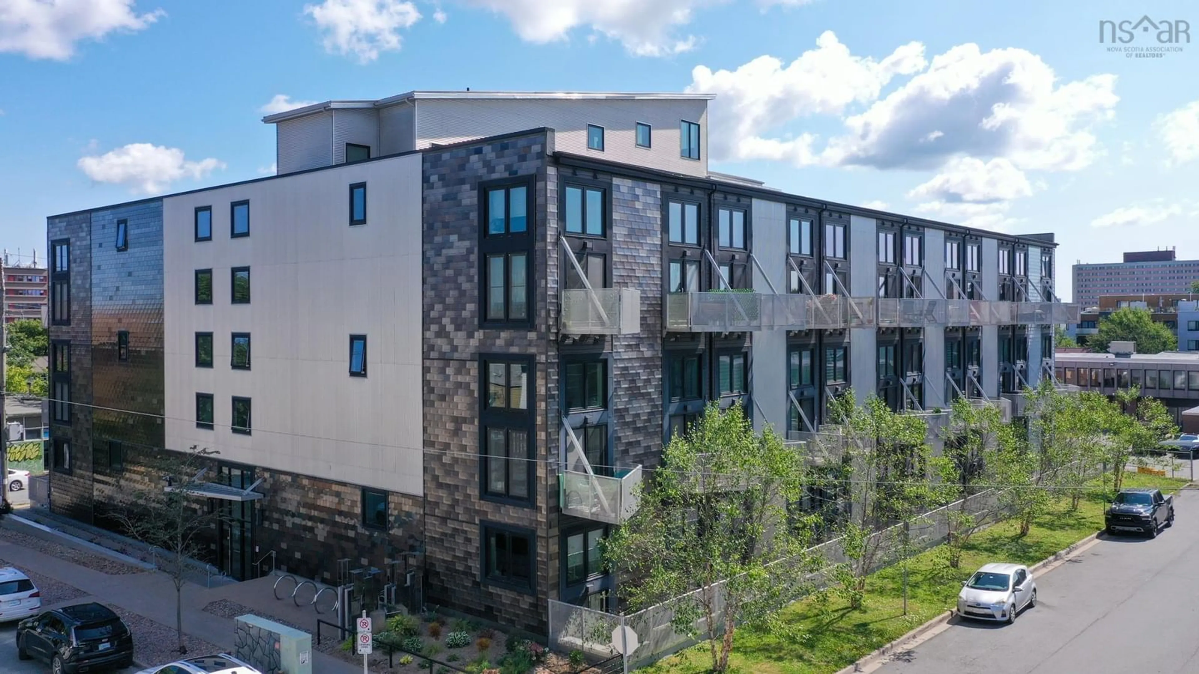 A pic from outside/outdoor area/front of a property/back of a property/a pic from drone, building for 5662 Roberts St #323, Halifax Nova Scotia B3K 0E3