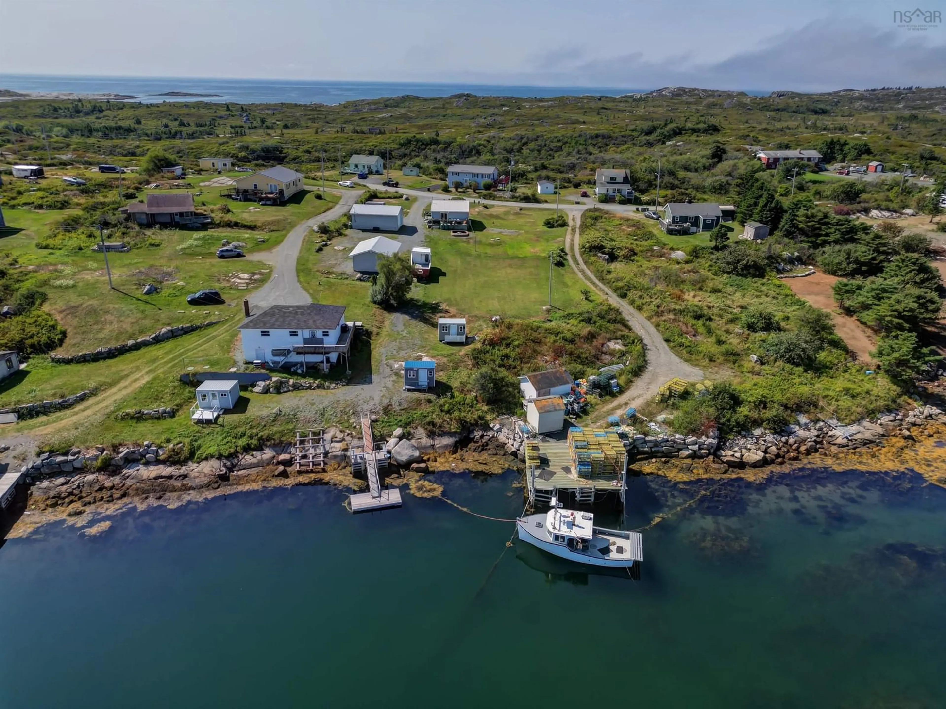 A pic from outside/outdoor area/front of a property/back of a property/a pic from drone, water/lake/river/ocean view for 78 West Dover Rd, West Dover Nova Scotia B3Z 3S7