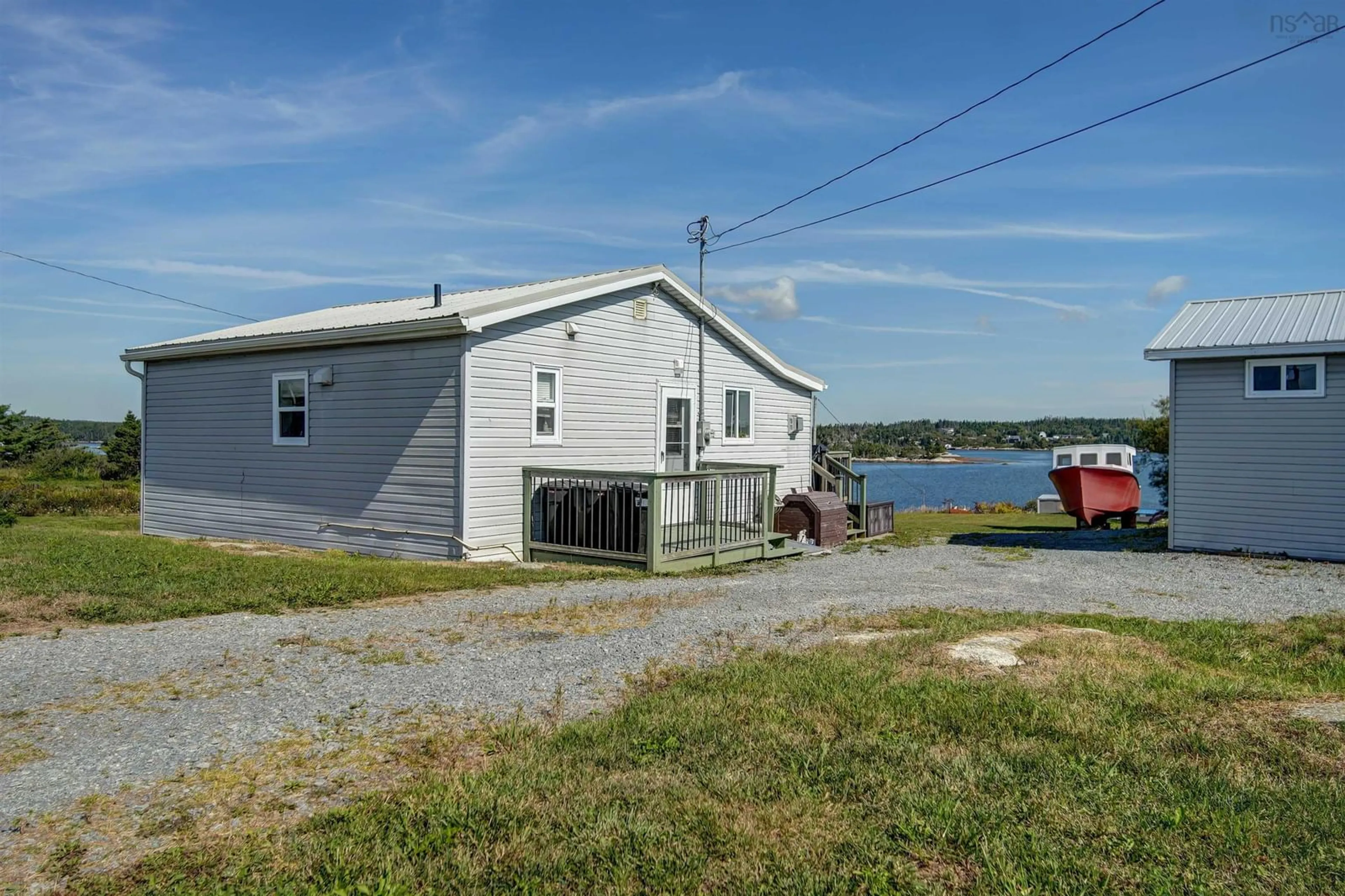 A pic from outside/outdoor area/front of a property/back of a property/a pic from drone, water/lake/river/ocean view for 78 West Dover Rd, West Dover Nova Scotia B3Z 3S7
