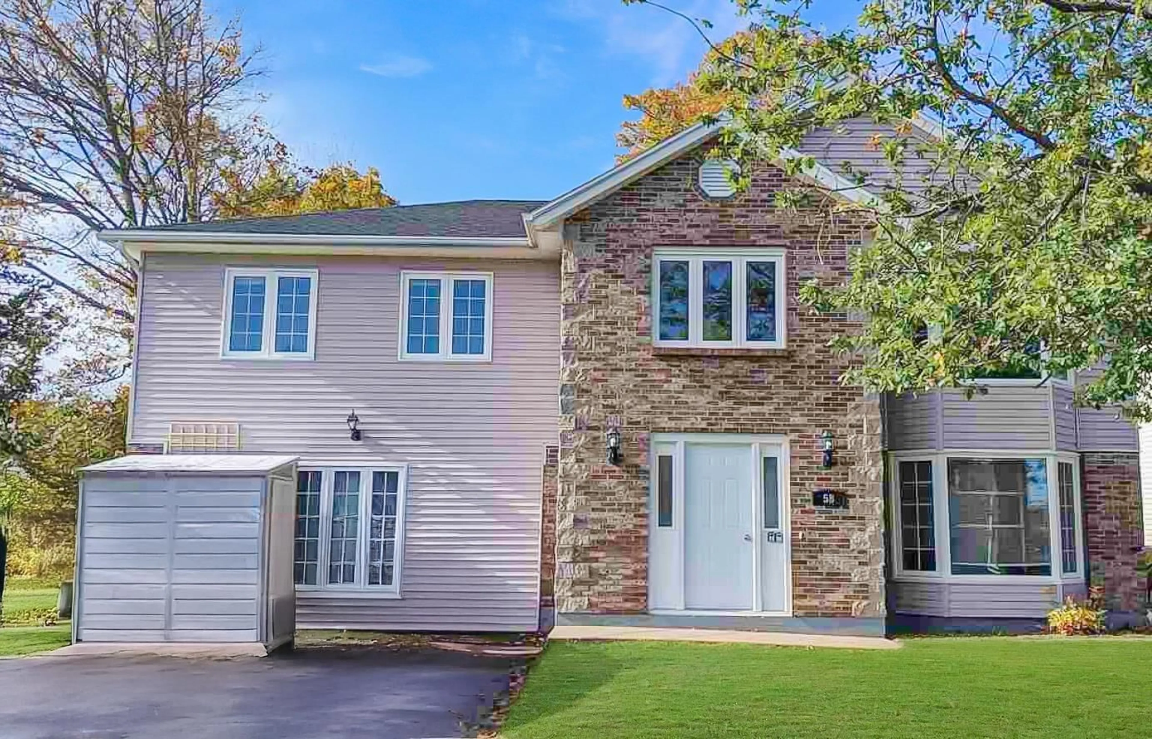 Home with brick exterior material, street for 58 Marsh Hawk Dr, Wolfville Nova Scotia B4P 1B2