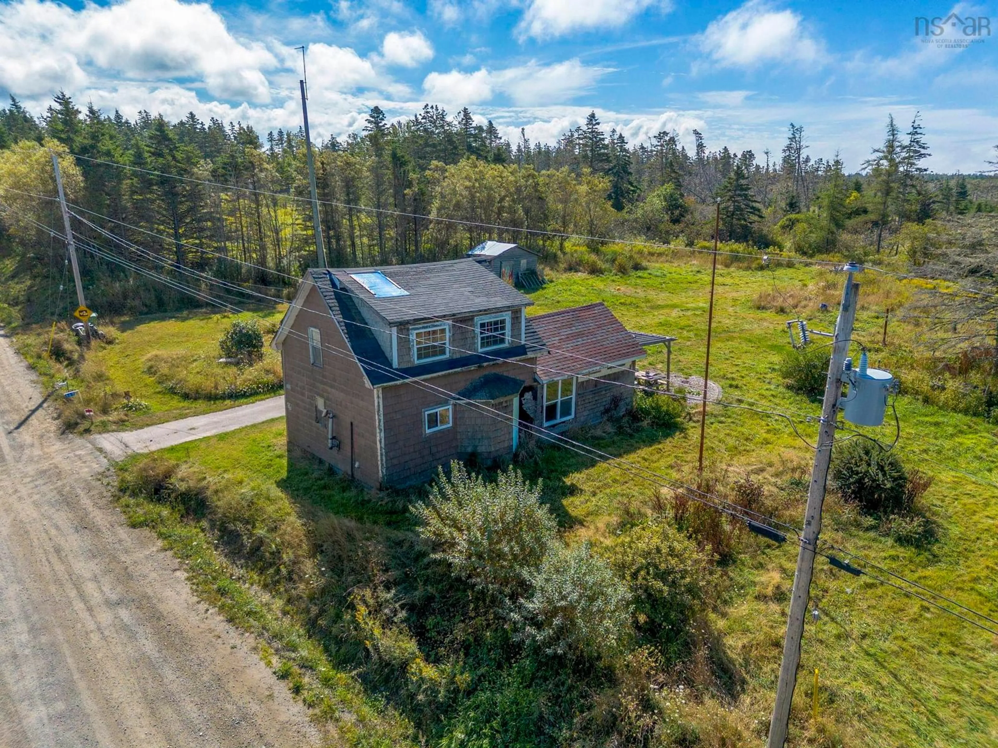 A pic from outside/outdoor area/front of a property/back of a property/a pic from drone, street for 567 C Boudreau Rd, Mavillette Nova Scotia B0W 2H0