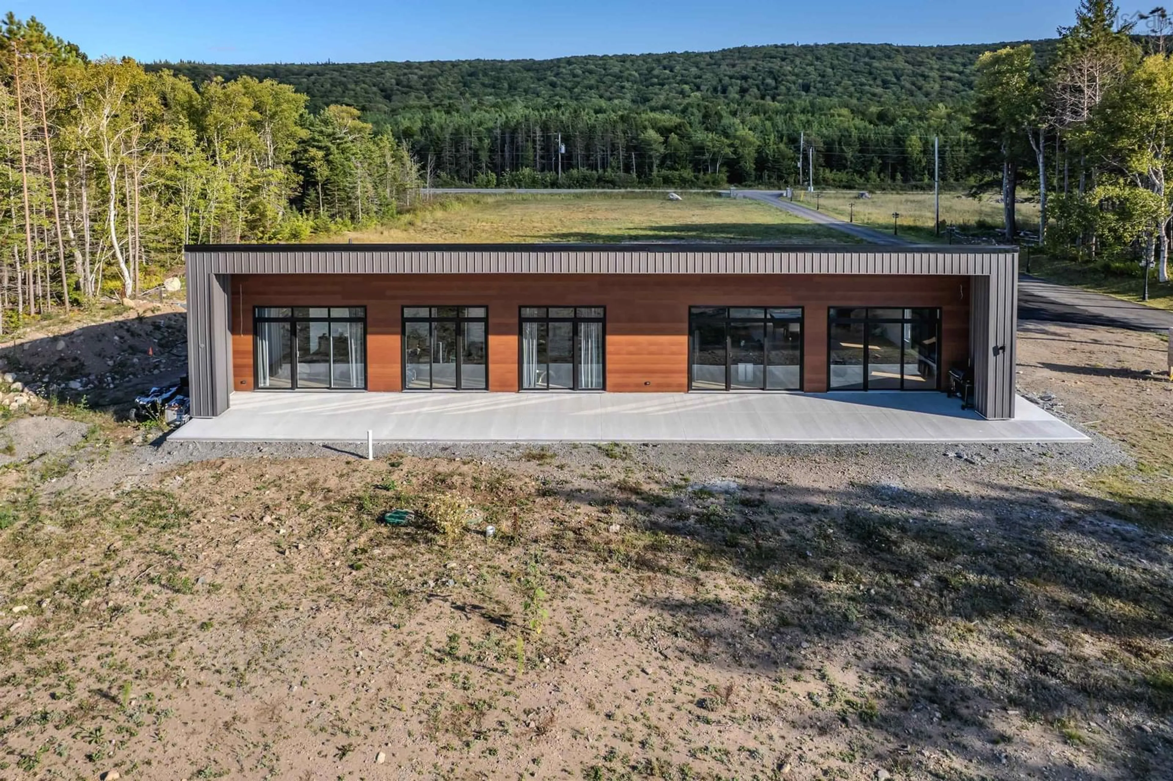 A pic from outside/outdoor area/front of a property/back of a property/a pic from drone, unknown for 5416 East Bay Hwy, Ben Eoin Nova Scotia B1J 1P4
