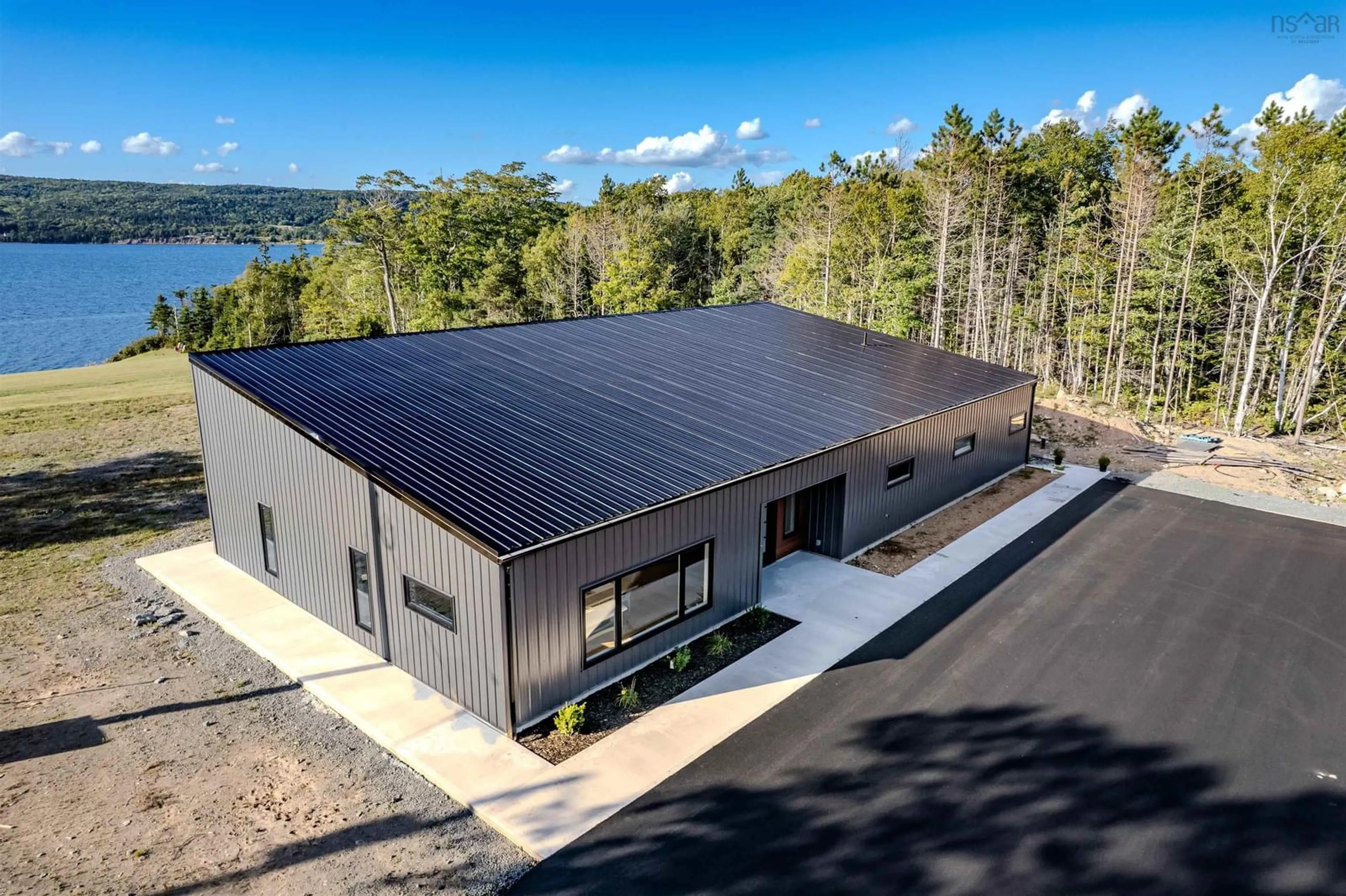 A pic from outside/outdoor area/front of a property/back of a property/a pic from drone, building for 5416 East Bay Hwy, Ben Eoin Nova Scotia B1J 1P4