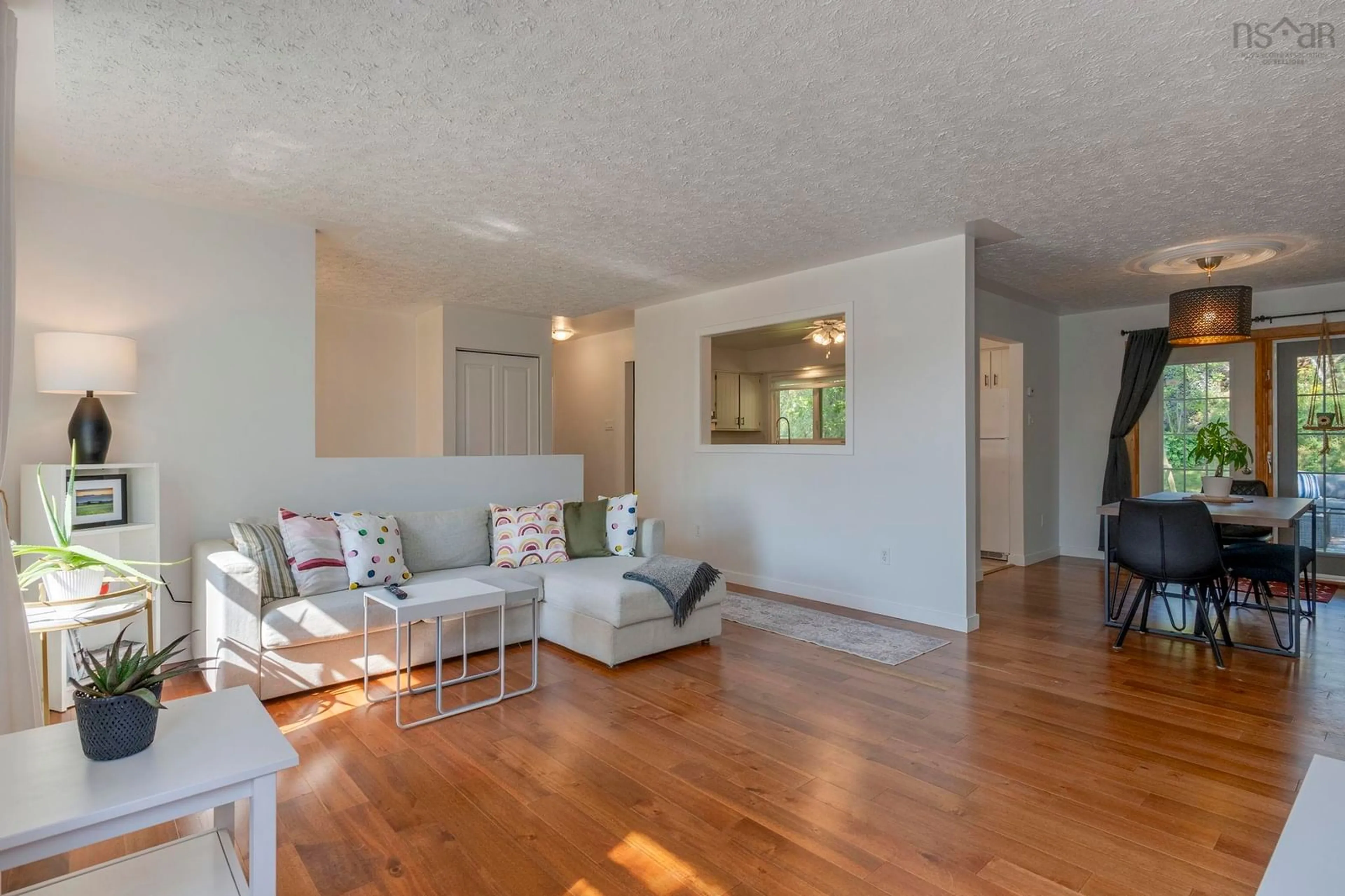 Living room with furniture, wood/laminate floor for 98 Collins Grove, Dartmouth Nova Scotia B2W 4E6