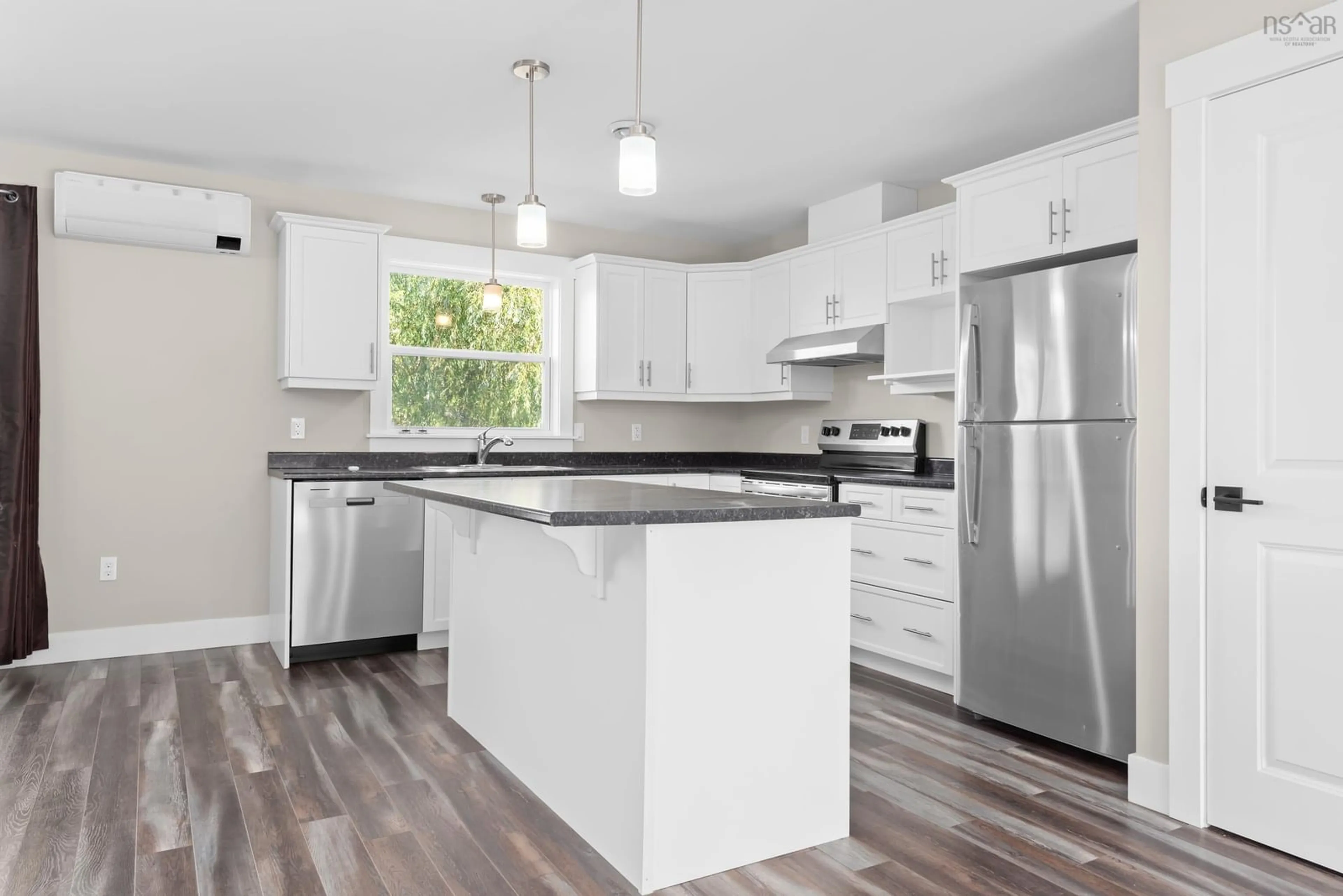 Open concept kitchen, wood/laminate floor for 1436 Hwy 2, Lantz Ns, Lantz Nova Scotia B2S 1Z8