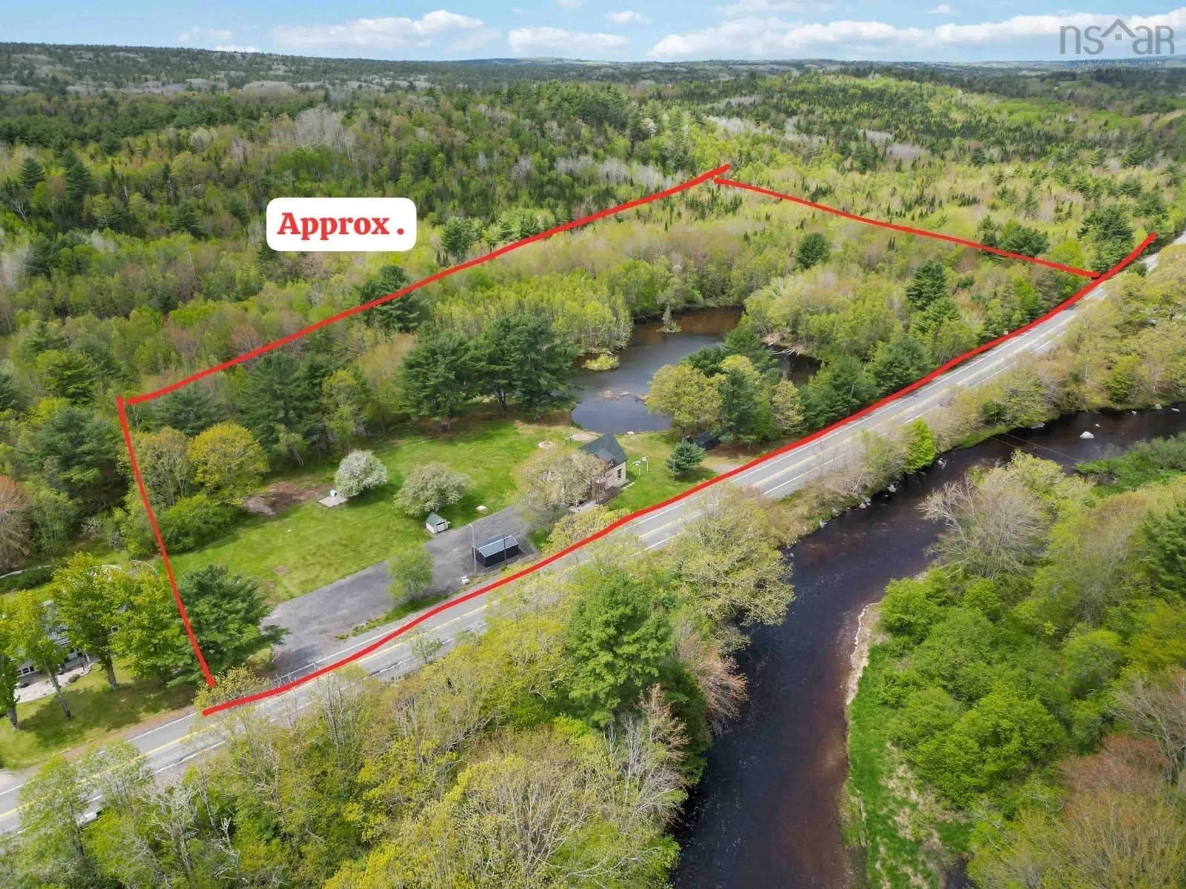 A pic from outside/outdoor area/front of a property/back of a property/a pic from drone, water/lake/river/ocean view for 6783 10 Hwy, New Germany Nova Scotia B0R 1E0