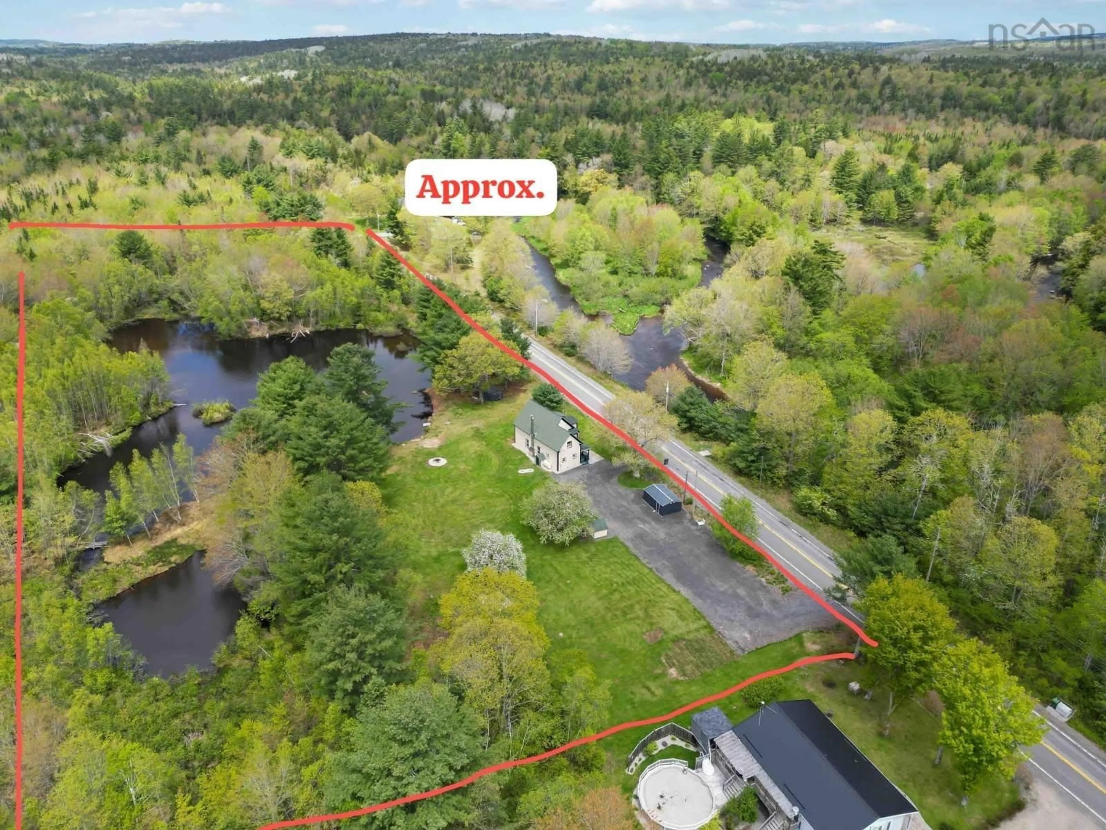 A pic from outside/outdoor area/front of a property/back of a property/a pic from drone, water/lake/river/ocean view for 6783 10 Hwy, New Germany Nova Scotia B0R 1E0