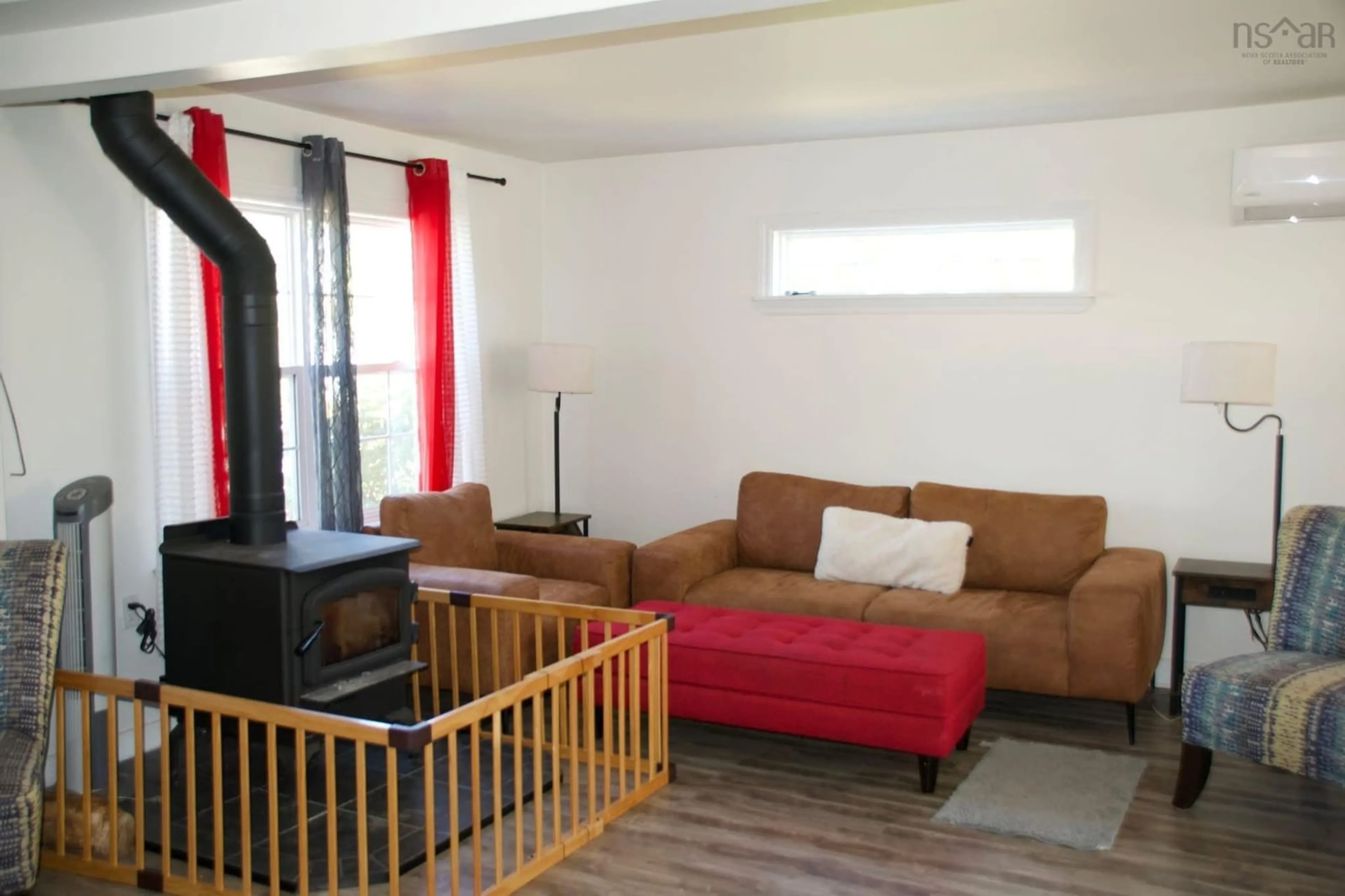 Living room with furniture, wood/laminate floor for 397 Shelburne St, New Glasgow Nova Scotia B2H 3K7
