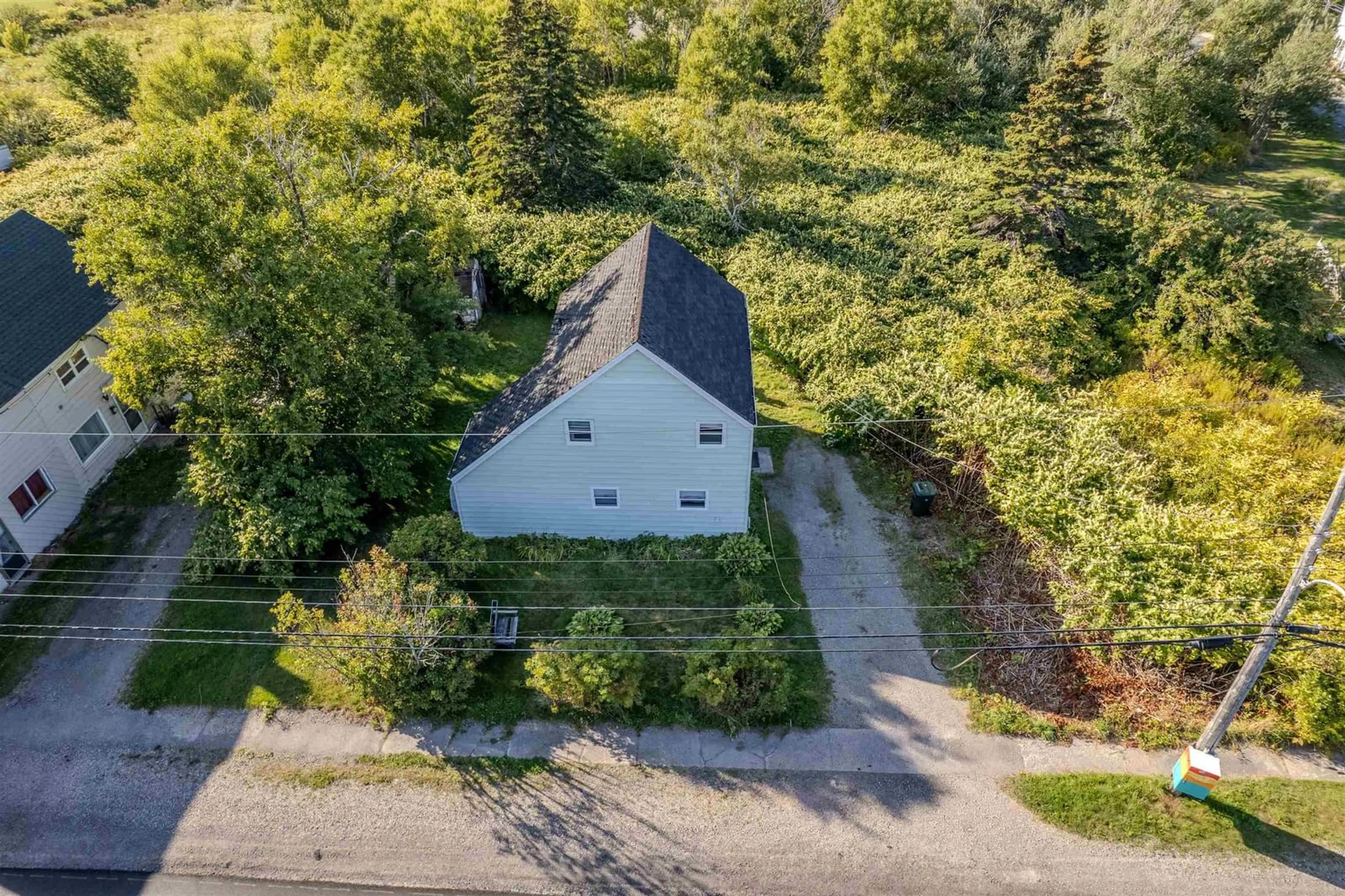 A pic from outside/outdoor area/front of a property/back of a property/a pic from drone, street for 86 School St, Glace Bay Nova Scotia B1A 1J4