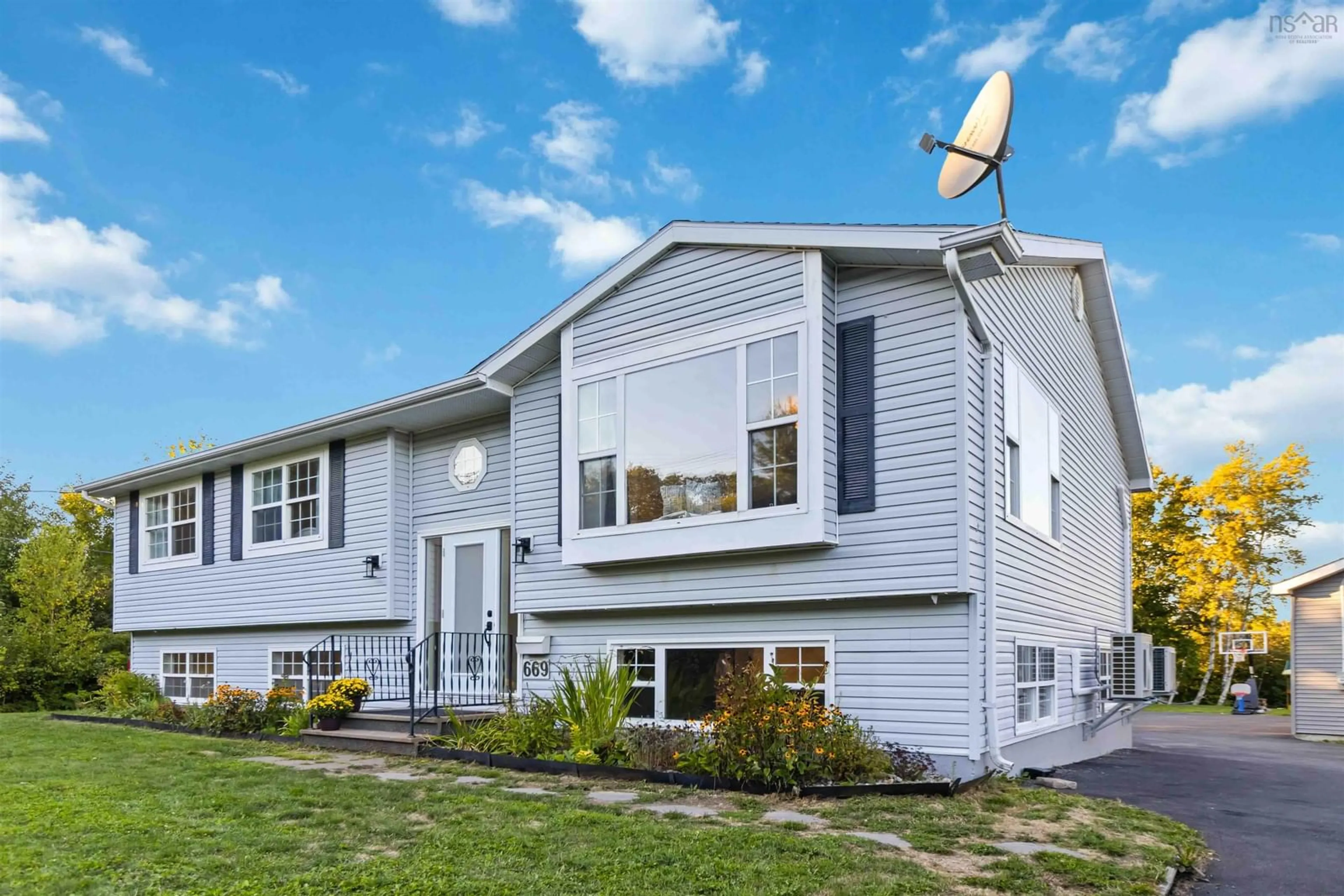 Home with vinyl exterior material, street for 667/669 Hammonds Plains Rd, Bedford Nova Scotia B4B 1A6
