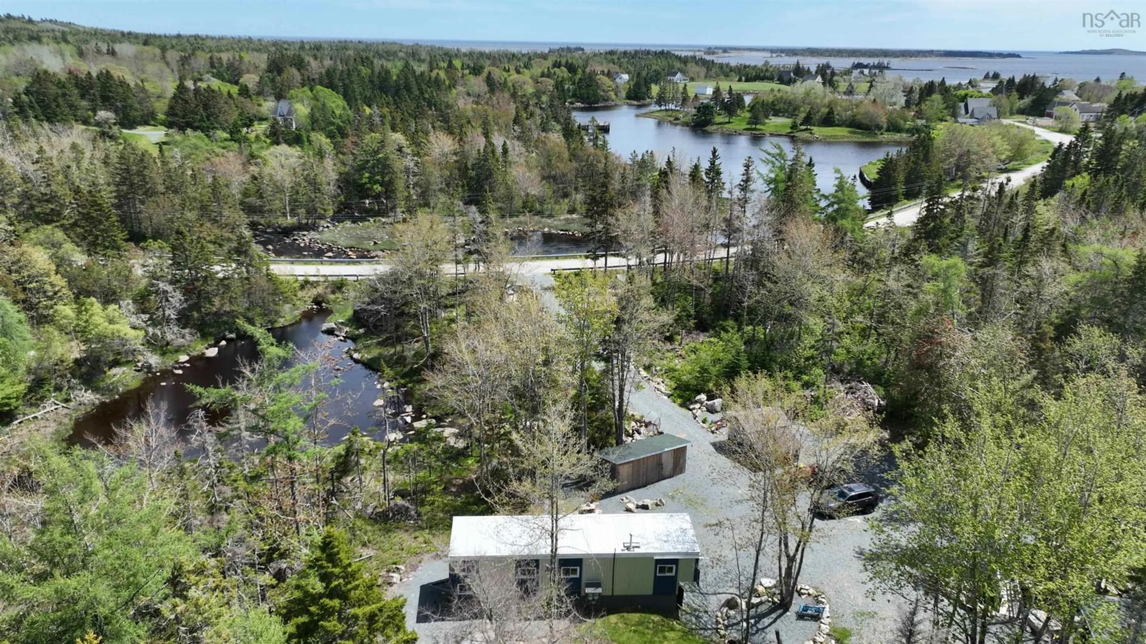 A pic from outside/outdoor area/front of a property/back of a property/a pic from drone, water/lake/river/ocean view for 8630 Highway 331, Voglers Cove Nova Scotia B0J 2H0