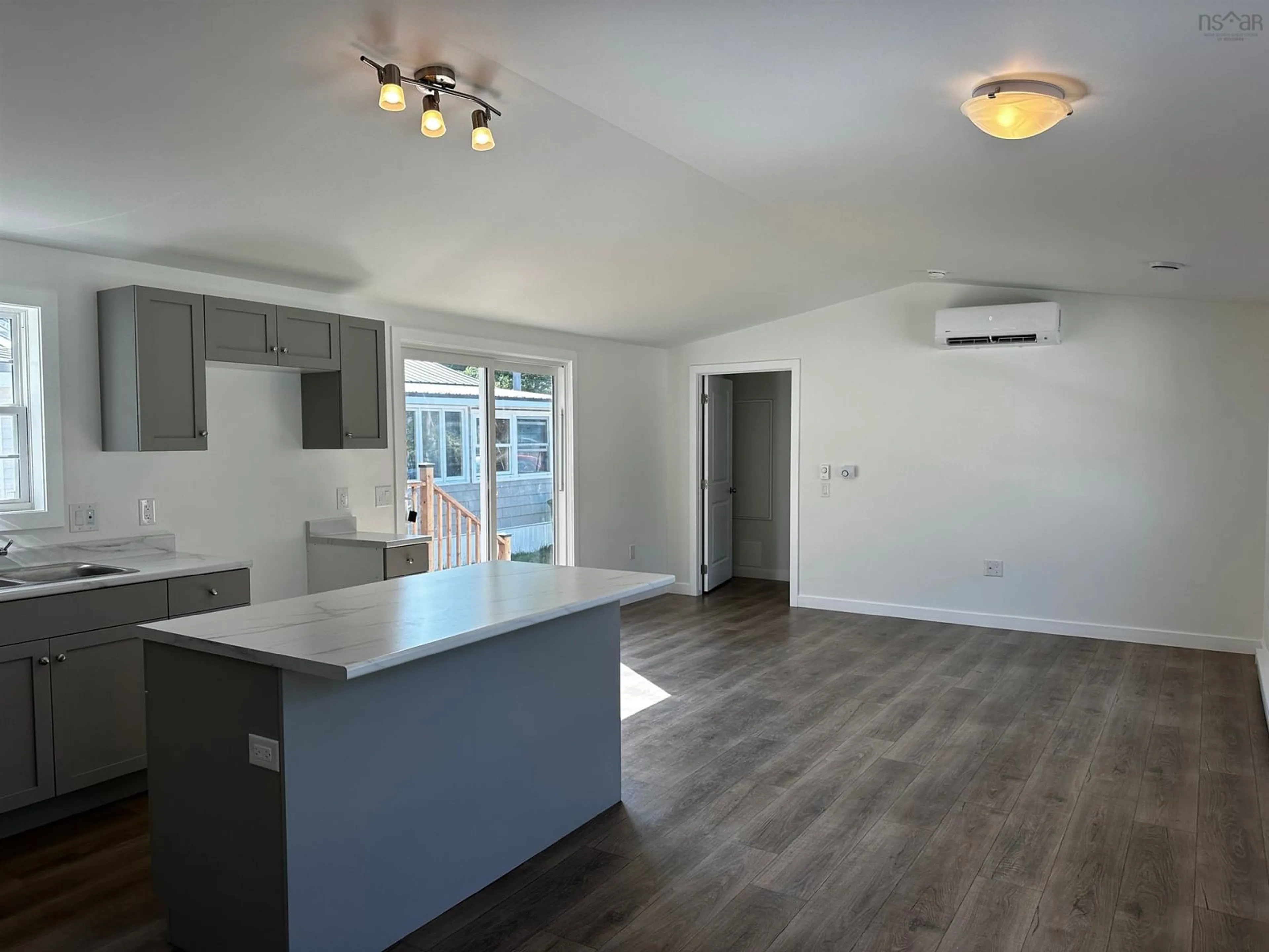 Open concept kitchen, wood/laminate floor for 84 Homco Dr, New Minas Nova Scotia B4N 3Y5