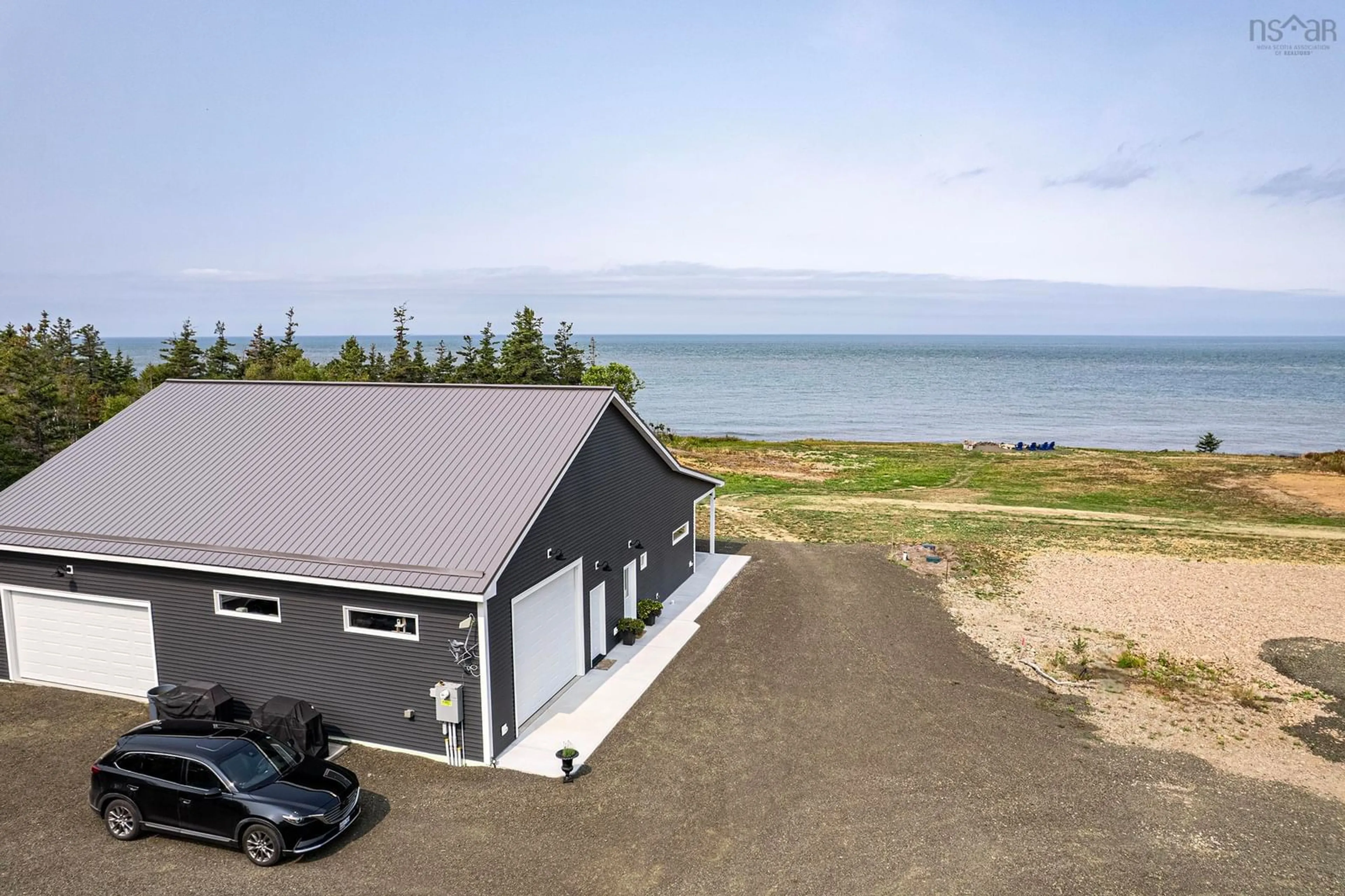 A pic from outside/outdoor area/front of a property/back of a property/a pic from drone, water/lake/river/ocean view for 2001 Hampton Mountain Rd, Hampton Nova Scotia B0S 1L0