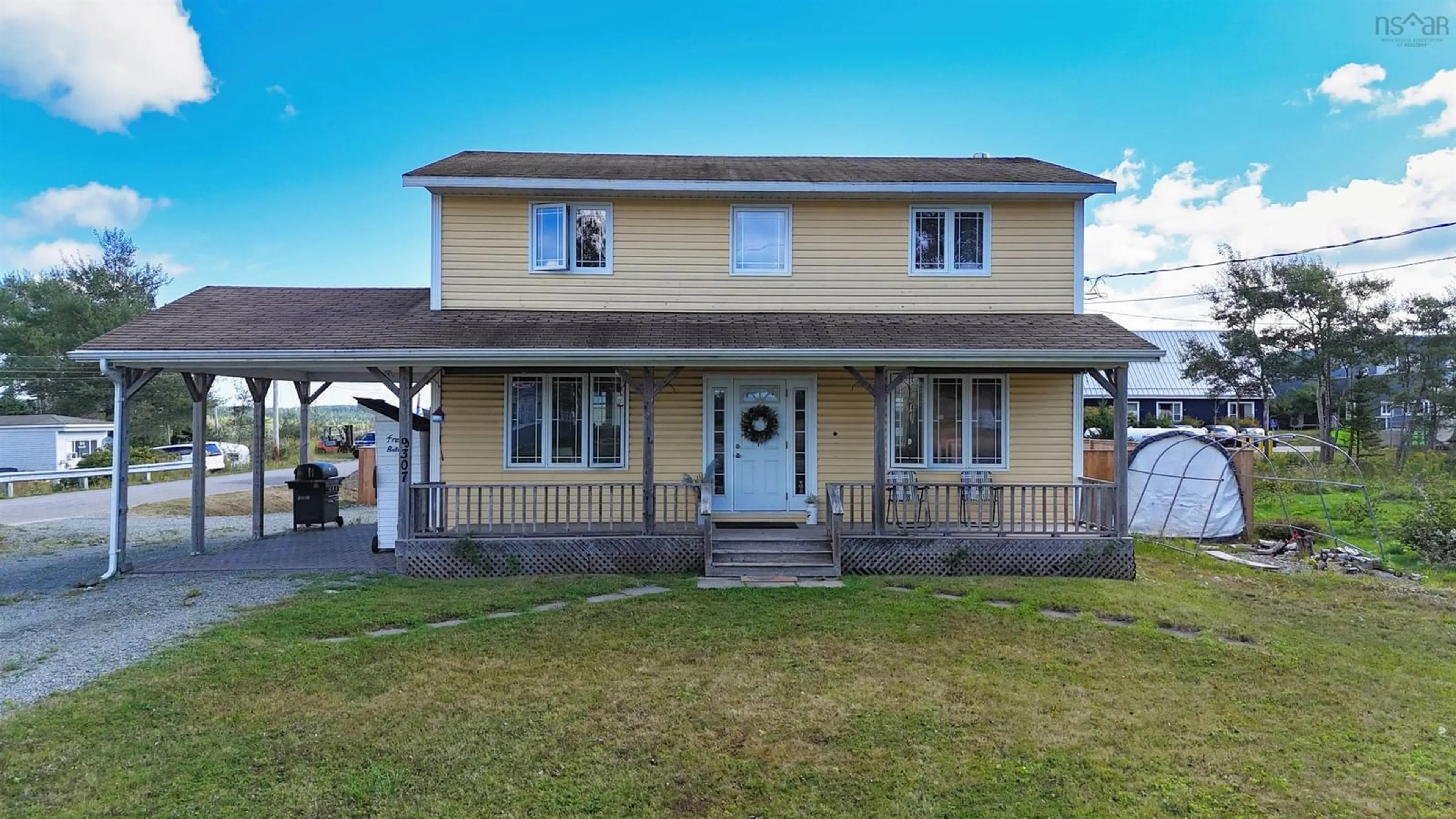 Home with vinyl exterior material, street for 9307 Pepperell St, St. Peter's Nova Scotia B0E 3B0