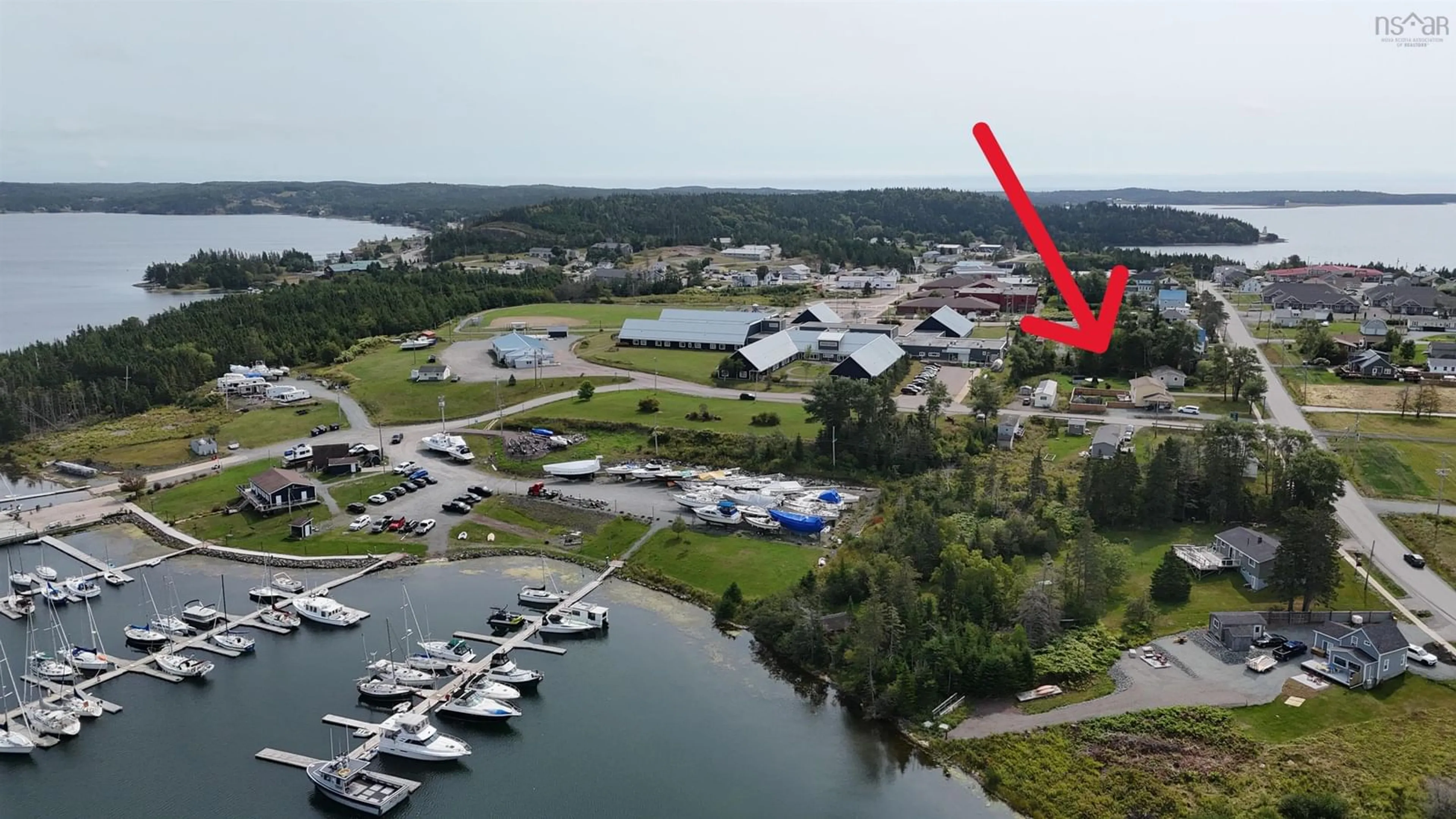 A pic from outside/outdoor area/front of a property/back of a property/a pic from drone, water/lake/river/ocean view for 9307 Pepperell St, St. Peter's Nova Scotia B0E 3B0