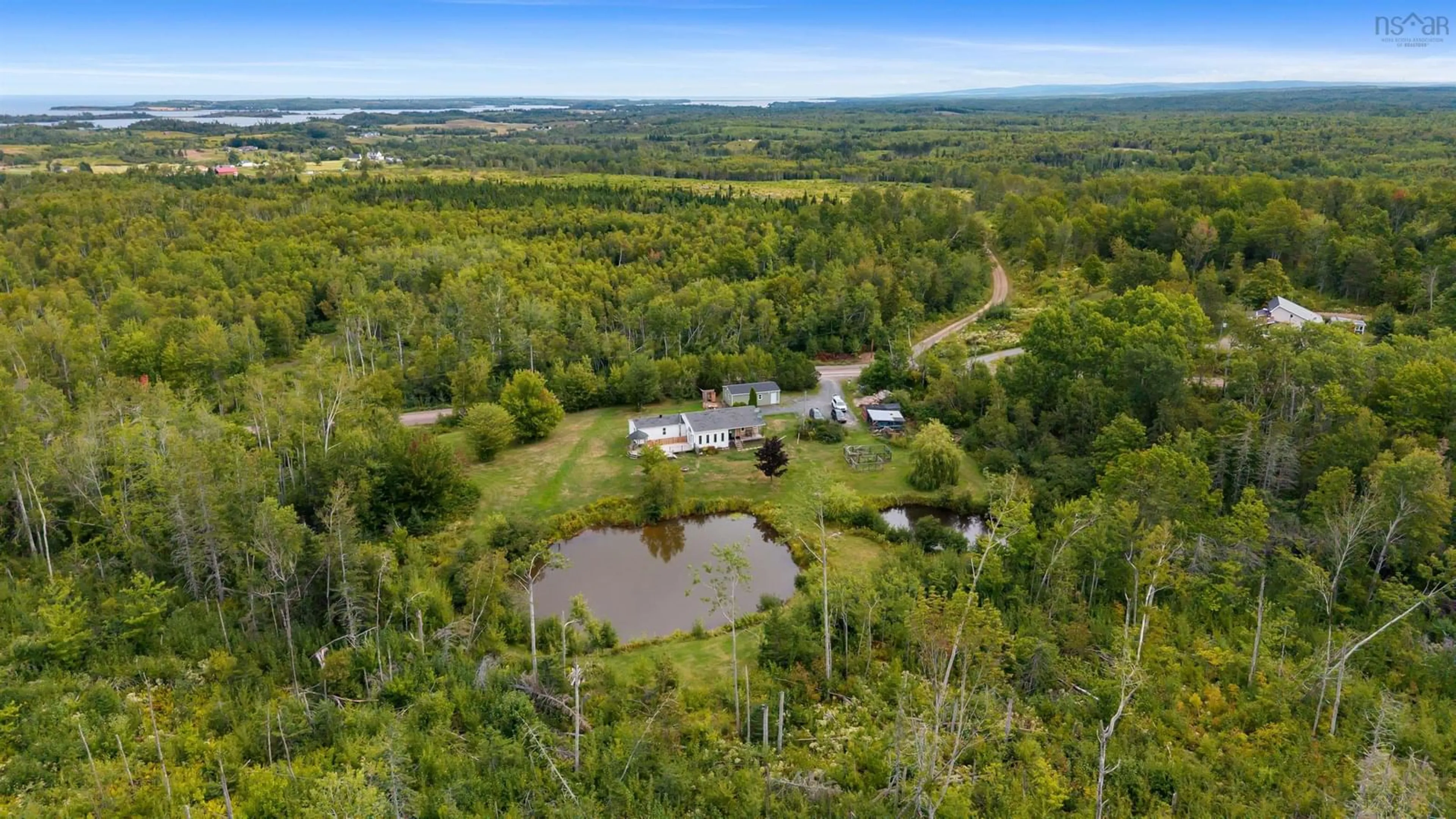 A pic from outside/outdoor area/front of a property/back of a property/a pic from drone, water/lake/river/ocean view for 719 Lamont Rd, Egerton Nova Scotia B0K 1G0