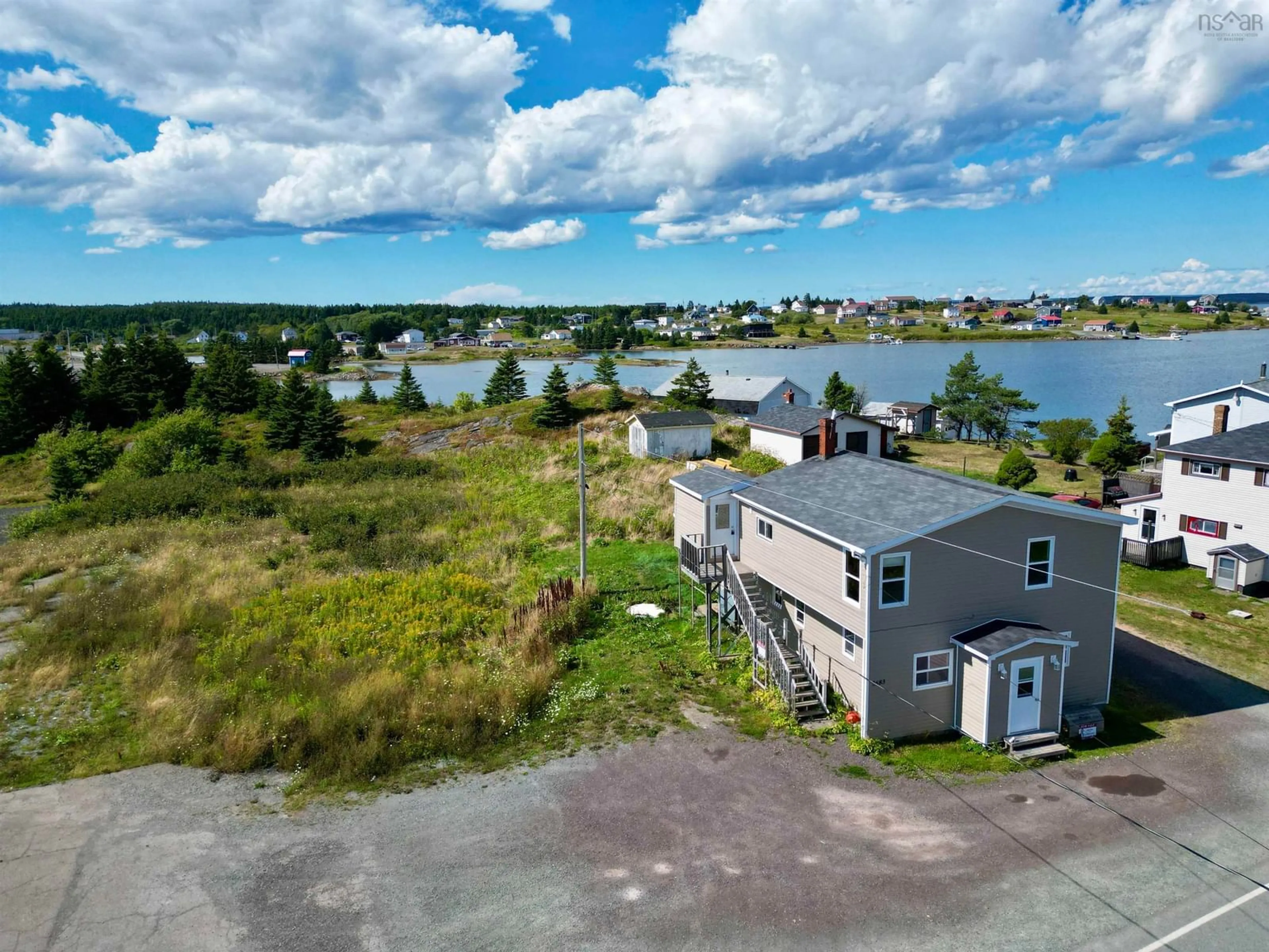 A pic from outside/outdoor area/front of a property/back of a property/a pic from drone, water/lake/river/ocean view for 3683 Highway 206, Haut De La Baie Nova Scotia B0E 2L0