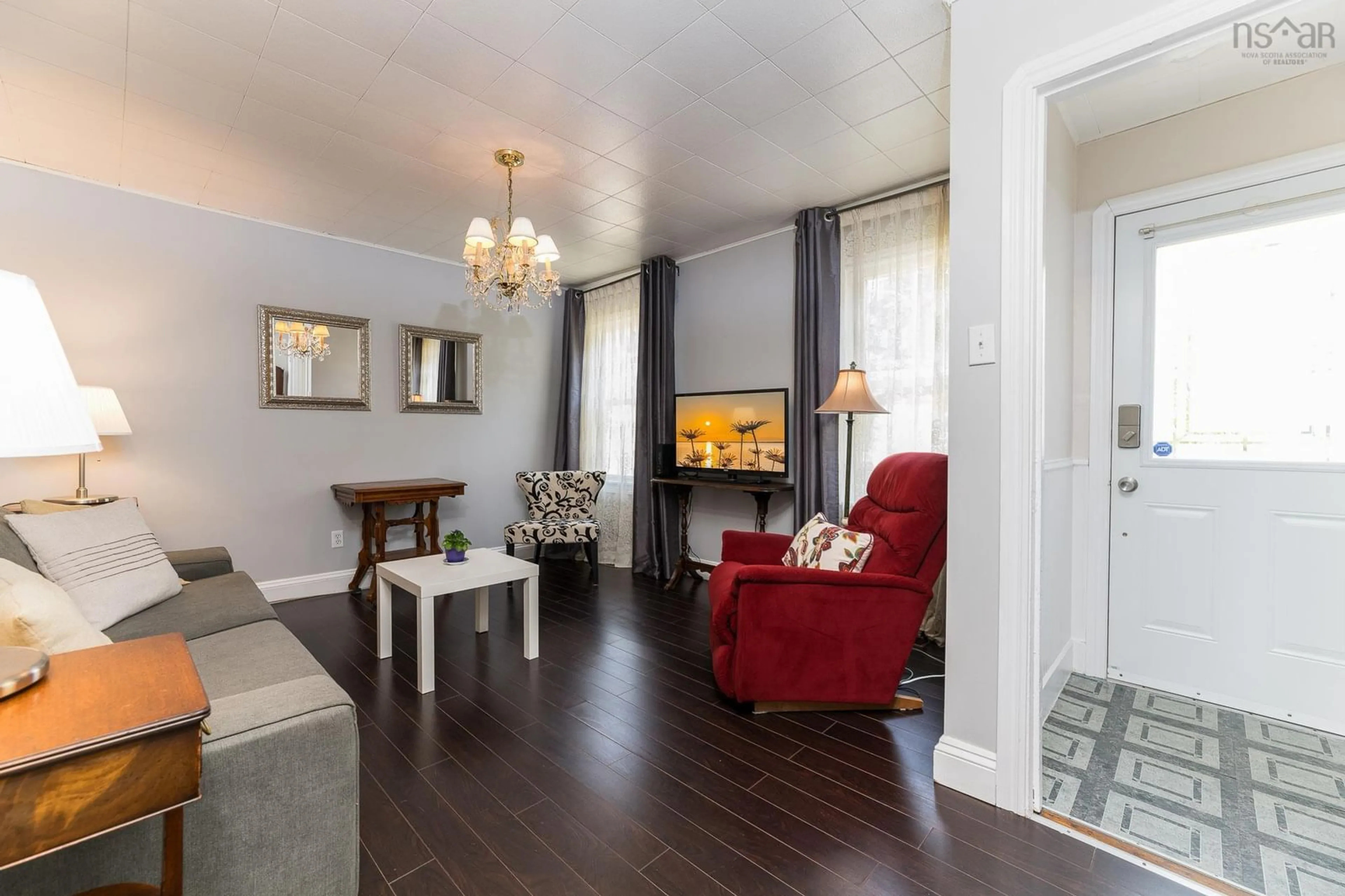 Living room with furniture, wood/laminate floor for 39 Russell St, Dartmouth Nova Scotia B3A 3M7